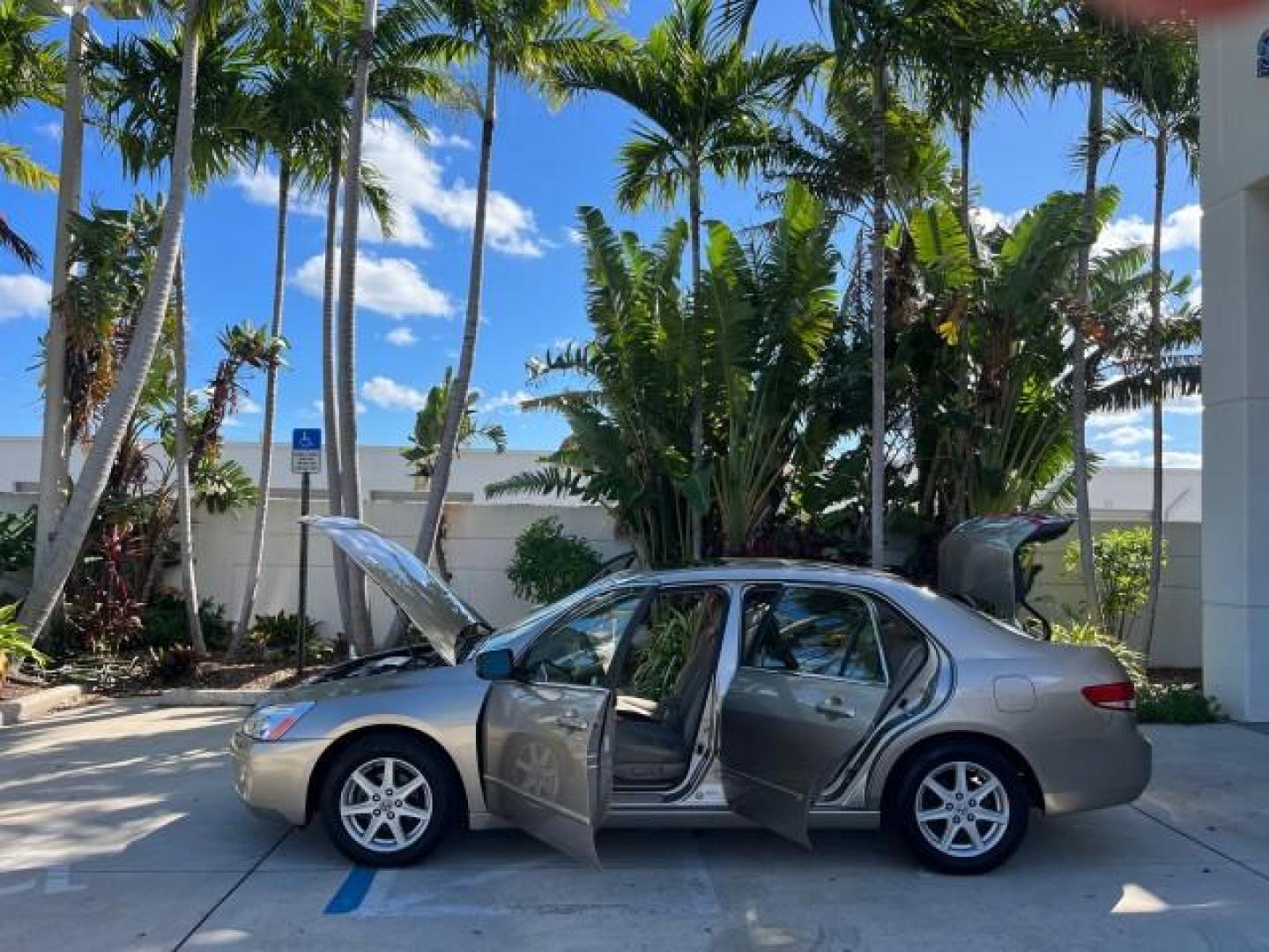 2003 Desert Mist Metallic /Ivory Honda Accord Sdn 26 SERV EX LOW MILES 79,568 (1HGCM66583A) with an 3.0L SOHC 24-Valve VTEC V6 LEV-Certified Engine engine, Automatic transmission, located at 4701 North Dixie Hwy, Pompano Beach, FL, 33064, (954) 422-2889, 26.240938, -80.123474 - OUR WEBPAGE FLORIDACARS1.COM HAS OVER 100 PHOTOS AND FREE CARFAX LINK 2003 HONDA ACCORD EX V-6 ROAD READY 3.0L V6 VIN: 1HGCM66583A061328 NO RECALLS 30 MPG SEDAN 4 DR FLORIDA OWNER 3.0L V6 F SOHC 24V LOW MILES 79,568 GASOLINE POWER LEATHER SEATS FRONT WHEEL DRIVE 26 SERVICE RECORDS POWER SUNROOF Allo - Photo#8