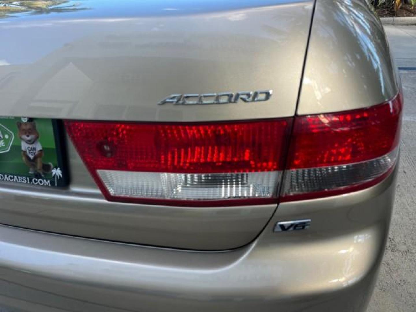 2003 Desert Mist Metallic /Ivory Honda Accord Sdn 26 SERV EX LOW MILES 79,568 (1HGCM66583A) with an 3.0L SOHC 24-Valve VTEC V6 LEV-Certified Engine engine, Automatic transmission, located at 4701 North Dixie Hwy, Pompano Beach, FL, 33064, (954) 422-2889, 26.240938, -80.123474 - OUR WEBPAGE FLORIDACARS1.COM HAS OVER 100 PHOTOS AND FREE CARFAX LINK 2003 HONDA ACCORD EX V-6 ROAD READY 3.0L V6 VIN: 1HGCM66583A061328 NO RECALLS 30 MPG SEDAN 4 DR FLORIDA OWNER 3.0L V6 F SOHC 24V LOW MILES 79,568 GASOLINE POWER LEATHER SEATS FRONT WHEEL DRIVE 26 SERVICE RECORDS POWER SUNROOF Allo - Photo#90