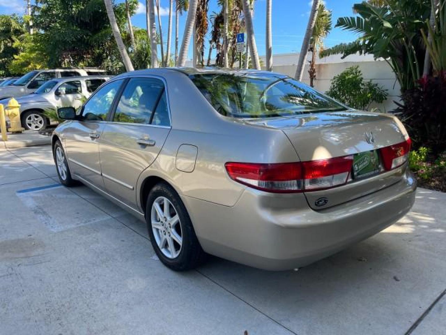 2003 Desert Mist Metallic /Ivory Honda Accord Sdn 26 SERV EX LOW MILES 79,568 (1HGCM66583A) with an 3.0L SOHC 24-Valve VTEC V6 LEV-Certified Engine engine, Automatic transmission, located at 4701 North Dixie Hwy, Pompano Beach, FL, 33064, (954) 422-2889, 26.240938, -80.123474 - OUR WEBPAGE FLORIDACARS1.COM HAS OVER 100 PHOTOS AND FREE CARFAX LINK 2003 HONDA ACCORD EX V-6 ROAD READY 3.0L V6 VIN: 1HGCM66583A061328 NO RECALLS 30 MPG SEDAN 4 DR FLORIDA OWNER 3.0L V6 F SOHC 24V LOW MILES 79,568 GASOLINE POWER LEATHER SEATS FRONT WHEEL DRIVE 26 SERVICE RECORDS POWER SUNROOF Allo - Photo#96