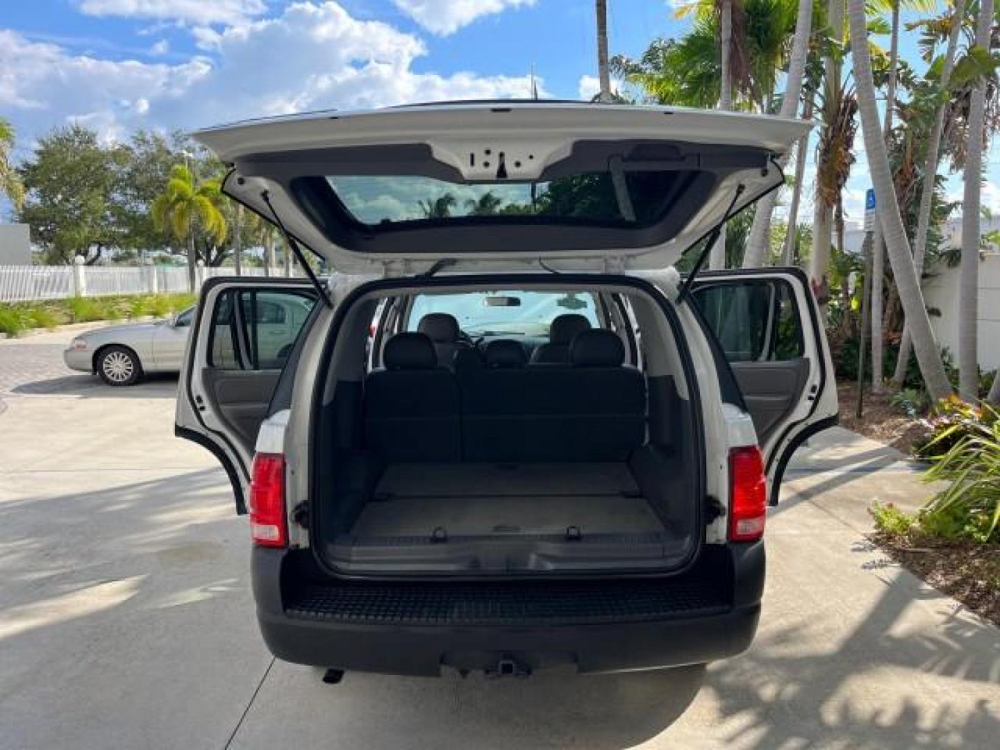 2004 Oxford White /Midnight Grey Ford Explorer 1 FL XLS LOW MILES 67,953 (1FMZU62K04U) with an 4.0L SOHC SEFI V6 FFV Engine engine, Automatic transmission, located at 4701 North Dixie Hwy, Pompano Beach, FL, 33064, (954) 422-2889, 26.240938, -80.123474 - OUR WEBPAGE FLORIDACARS1.COM HAS OVER 100 PHOTOS AND FREE CARFAX LINK 2004 FORD EXPLORER XLS ROAD READY 4.0 V6 VIN: 1FMZU62K04UC24439 NO ACCIDENTS 4 DOOR WAGON/SPORT UTILITY NO RECALLS 4.0L V6 F SOHC 1 OWNER FLORIDA FLEX FUEL LOW MILES 67,953 REAR WHEEL DRIVE 16 SERVICE RECORDS Approach Lights Black - Photo#15