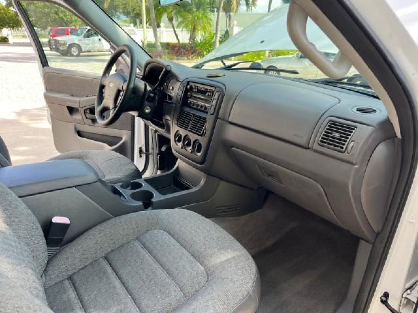 2004 Oxford White /Midnight Grey Ford Explorer 1 FL XLS LOW MILES 67,953 (1FMZU62K04U) with an 4.0L SOHC SEFI V6 FFV Engine engine, Automatic transmission, located at 4701 North Dixie Hwy, Pompano Beach, FL, 33064, (954) 422-2889, 26.240938, -80.123474 - OUR WEBPAGE FLORIDACARS1.COM HAS OVER 100 PHOTOS AND FREE CARFAX LINK 2004 FORD EXPLORER XLS ROAD READY 4.0 V6 VIN: 1FMZU62K04UC24439 NO ACCIDENTS 4 DOOR WAGON/SPORT UTILITY NO RECALLS 4.0L V6 F SOHC 1 OWNER FLORIDA FLEX FUEL LOW MILES 67,953 REAR WHEEL DRIVE 16 SERVICE RECORDS Approach Lights Black - Photo#26