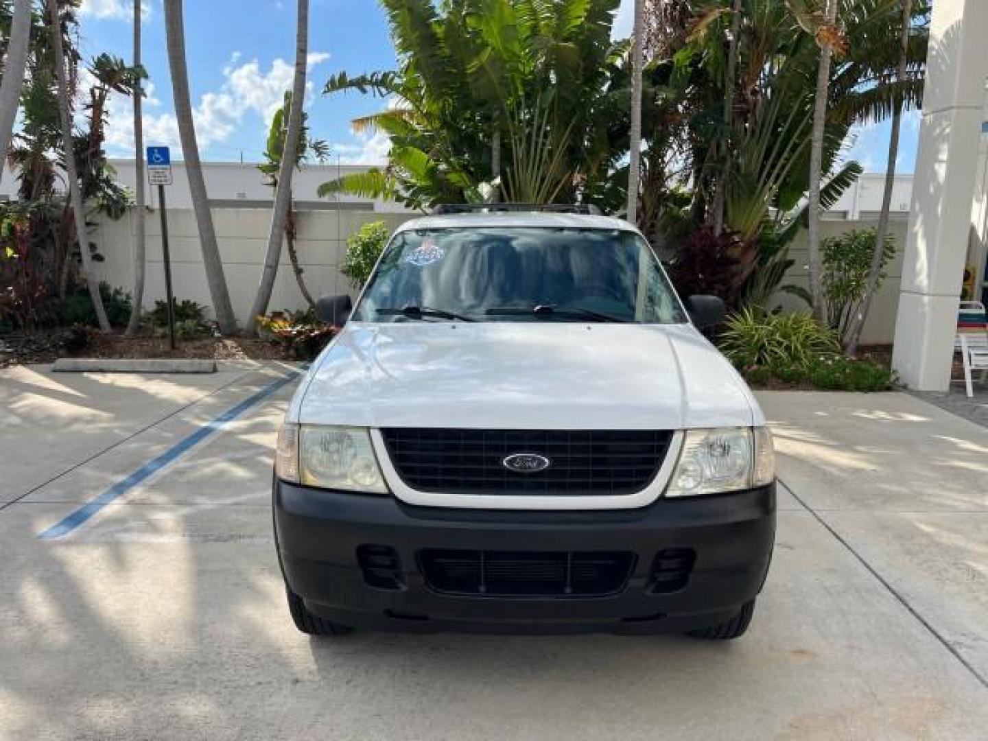 2004 Oxford White /Midnight Grey Ford Explorer 1 FL XLS LOW MILES 67,953 (1FMZU62K04U) with an 4.0L SOHC SEFI V6 FFV Engine engine, Automatic transmission, located at 4701 North Dixie Hwy, Pompano Beach, FL, 33064, (954) 422-2889, 26.240938, -80.123474 - OUR WEBPAGE FLORIDACARS1.COM HAS OVER 100 PHOTOS AND FREE CARFAX LINK 2004 FORD EXPLORER XLS ROAD READY 4.0 V6 VIN: 1FMZU62K04UC24439 NO ACCIDENTS 4 DOOR WAGON/SPORT UTILITY NO RECALLS 4.0L V6 F SOHC 1 OWNER FLORIDA FLEX FUEL LOW MILES 67,953 REAR WHEEL DRIVE 16 SERVICE RECORDS Approach Lights Black - Photo#2