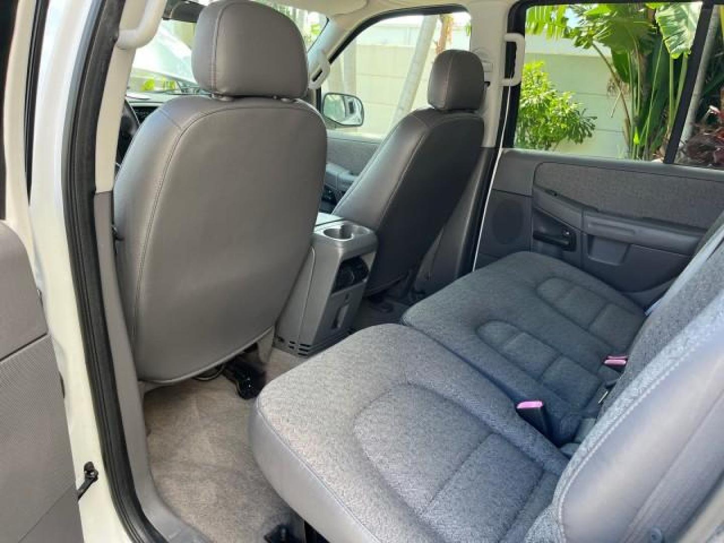 2004 Oxford White /Midnight Grey Ford Explorer 1 FL XLS LOW MILES 67,953 (1FMZU62K04U) with an 4.0L SOHC SEFI V6 FFV Engine engine, Automatic transmission, located at 4701 North Dixie Hwy, Pompano Beach, FL, 33064, (954) 422-2889, 26.240938, -80.123474 - OUR WEBPAGE FLORIDACARS1.COM HAS OVER 100 PHOTOS AND FREE CARFAX LINK 2004 FORD EXPLORER XLS ROAD READY 4.0 V6 VIN: 1FMZU62K04UC24439 NO ACCIDENTS 4 DOOR WAGON/SPORT UTILITY NO RECALLS 4.0L V6 F SOHC 1 OWNER FLORIDA FLEX FUEL LOW MILES 67,953 REAR WHEEL DRIVE 16 SERVICE RECORDS Approach Lights Black - Photo#38