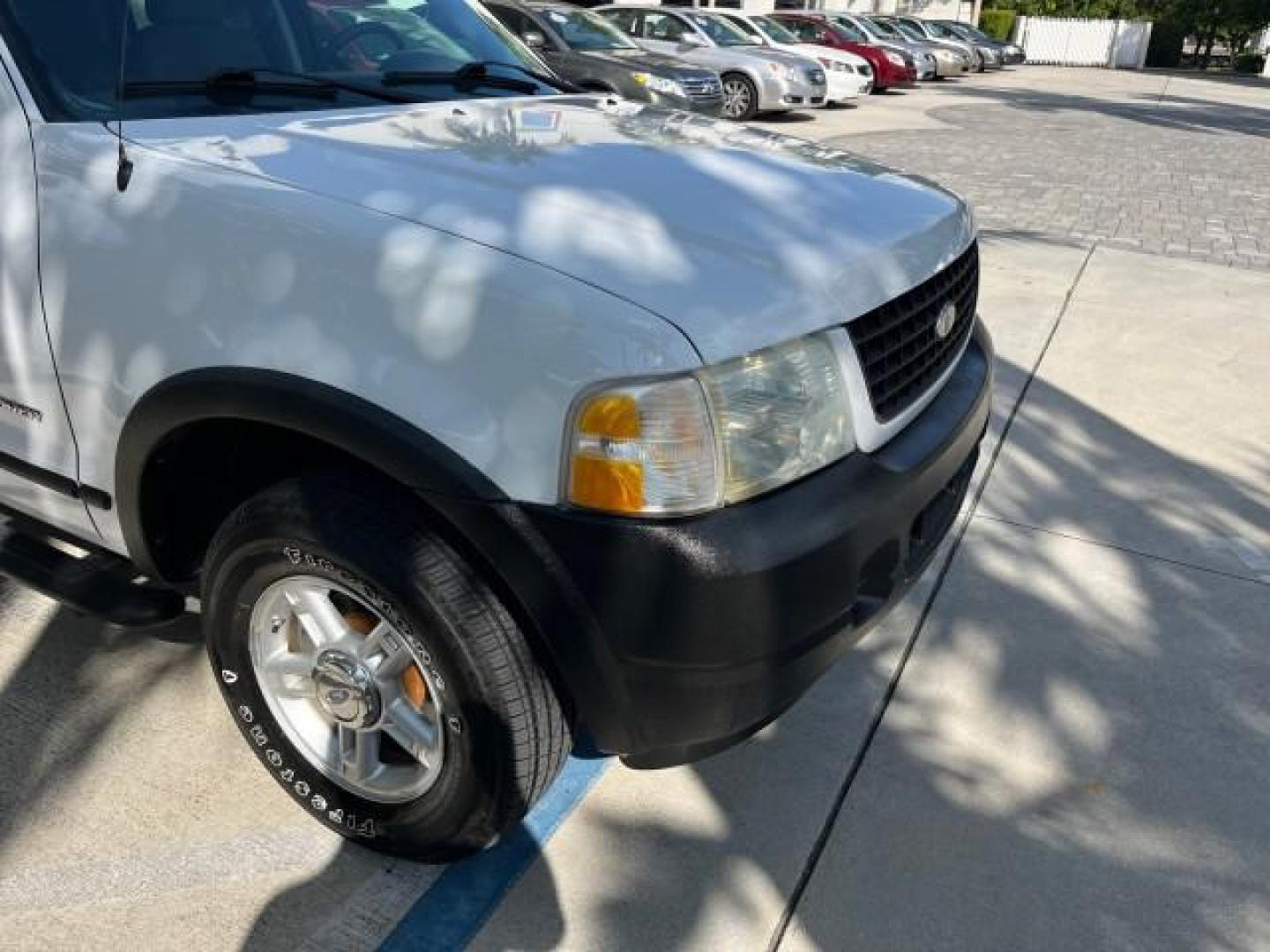 2004 Oxford White /Midnight Grey Ford Explorer 1 FL XLS LOW MILES 67,953 (1FMZU62K04U) with an 4.0L SOHC SEFI V6 FFV Engine engine, Automatic transmission, located at 4701 North Dixie Hwy, Pompano Beach, FL, 33064, (954) 422-2889, 26.240938, -80.123474 - OUR WEBPAGE FLORIDACARS1.COM HAS OVER 100 PHOTOS AND FREE CARFAX LINK 2004 FORD EXPLORER XLS ROAD READY 4.0 V6 VIN: 1FMZU62K04UC24439 NO ACCIDENTS 4 DOOR WAGON/SPORT UTILITY NO RECALLS 4.0L V6 F SOHC 1 OWNER FLORIDA FLEX FUEL LOW MILES 67,953 REAR WHEEL DRIVE 16 SERVICE RECORDS Approach Lights Black - Photo#81