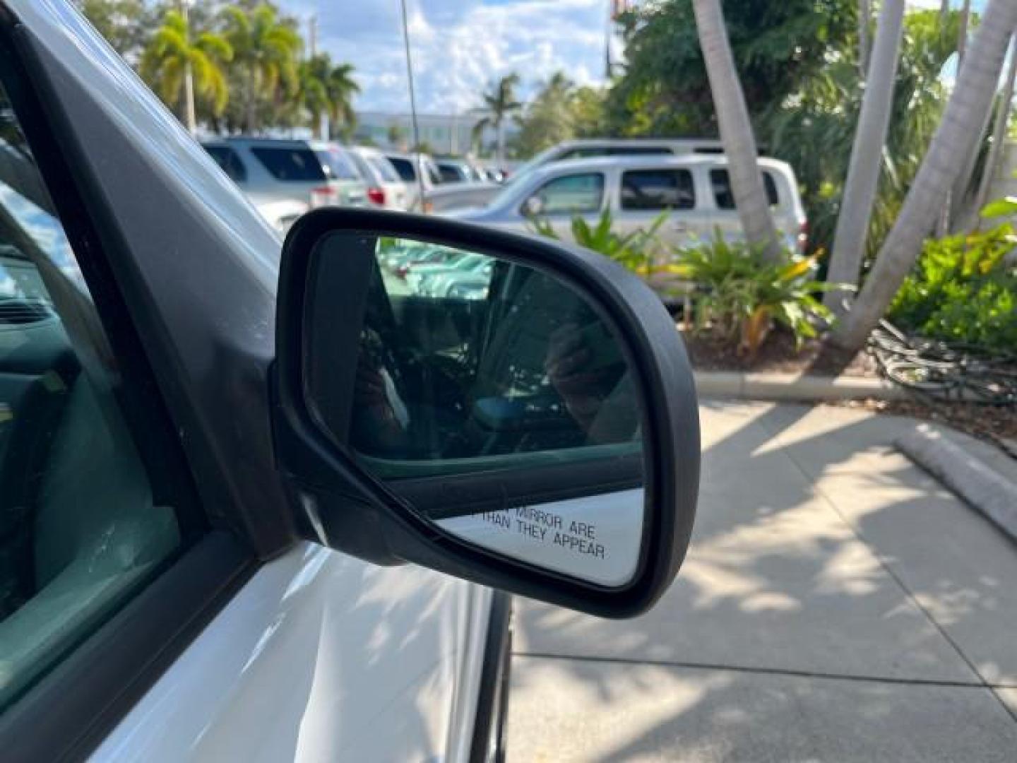 2004 Oxford White /Midnight Grey Ford Explorer 1 FL XLS LOW MILES 67,953 (1FMZU62K04U) with an 4.0L SOHC SEFI V6 FFV Engine engine, Automatic transmission, located at 4701 North Dixie Hwy, Pompano Beach, FL, 33064, (954) 422-2889, 26.240938, -80.123474 - OUR WEBPAGE FLORIDACARS1.COM HAS OVER 100 PHOTOS AND FREE CARFAX LINK 2004 FORD EXPLORER XLS ROAD READY 4.0 V6 VIN: 1FMZU62K04UC24439 NO ACCIDENTS 4 DOOR WAGON/SPORT UTILITY NO RECALLS 4.0L V6 F SOHC 1 OWNER FLORIDA FLEX FUEL LOW MILES 67,953 REAR WHEEL DRIVE 16 SERVICE RECORDS Approach Lights Black - Photo#89