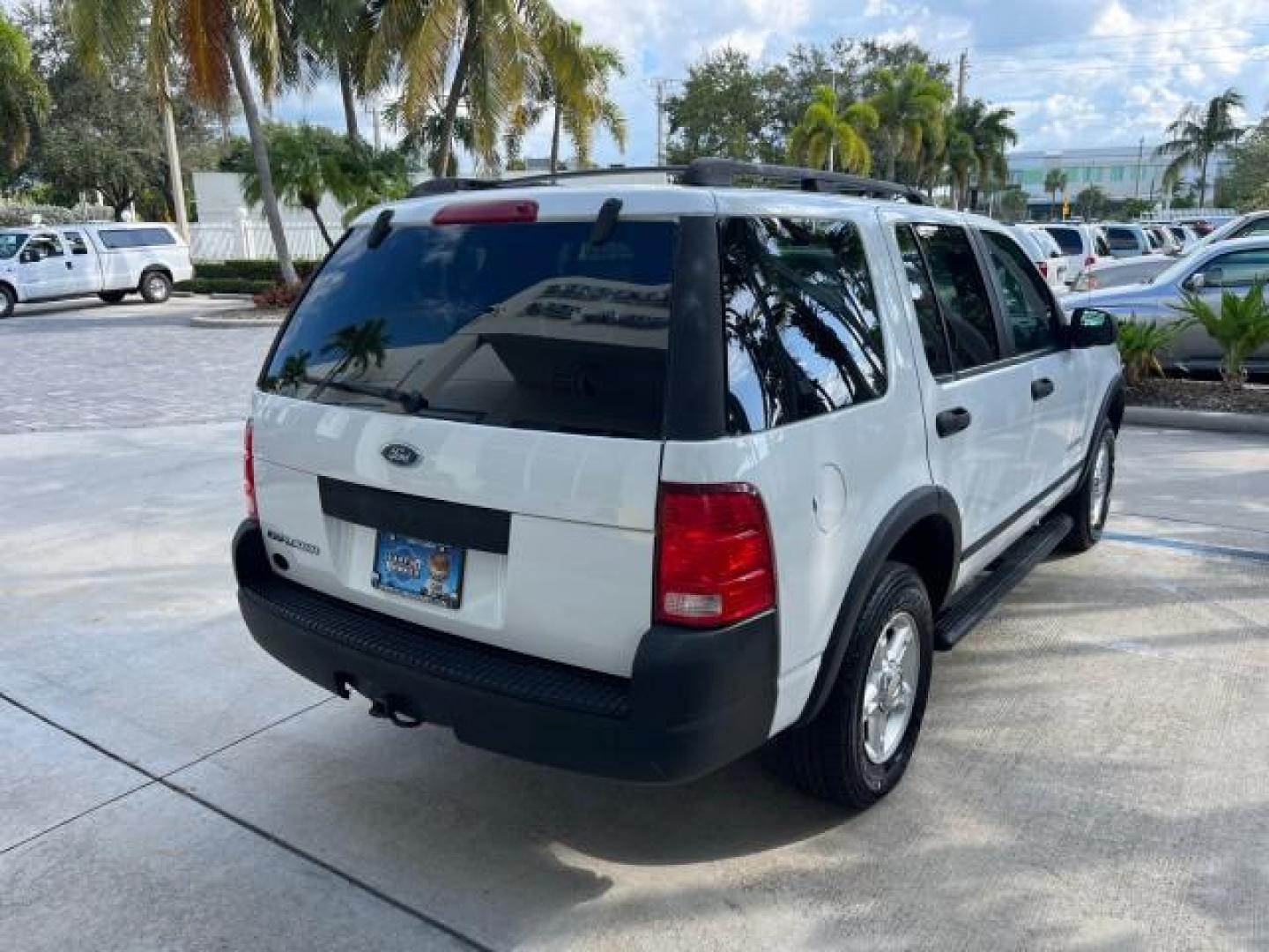 2004 Oxford White /Midnight Grey Ford Explorer 1 FL XLS LOW MILES 67,953 (1FMZU62K04U) with an 4.0L SOHC SEFI V6 FFV Engine engine, Automatic transmission, located at 4701 North Dixie Hwy, Pompano Beach, FL, 33064, (954) 422-2889, 26.240938, -80.123474 - OUR WEBPAGE FLORIDACARS1.COM HAS OVER 100 PHOTOS AND FREE CARFAX LINK 2004 FORD EXPLORER XLS ROAD READY 4.0 V6 VIN: 1FMZU62K04UC24439 NO ACCIDENTS 4 DOOR WAGON/SPORT UTILITY NO RECALLS 4.0L V6 F SOHC 1 OWNER FLORIDA FLEX FUEL LOW MILES 67,953 REAR WHEEL DRIVE 16 SERVICE RECORDS Approach Lights Black - Photo#98