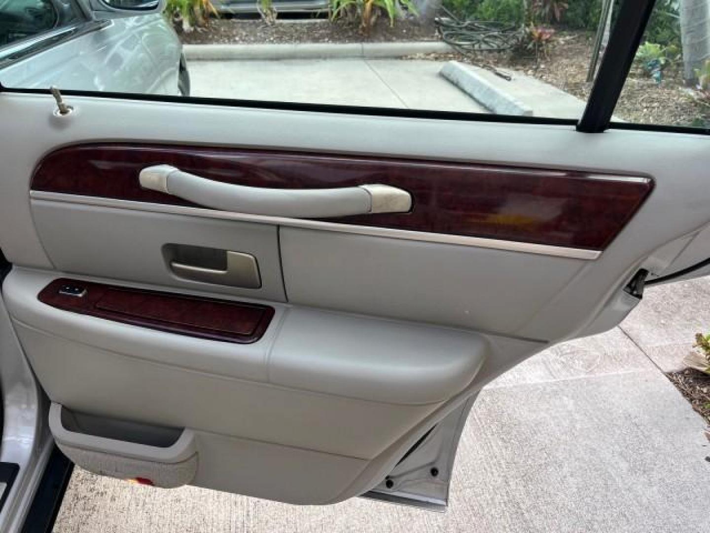 2005 Cashmere Tri-Coat /Shale/Dove Lincoln Town Car 1 FL Signature Limited LOW MILES 77,587 (1LNHM82W15Y) with an 4.6L SOHC SMPI V8 Engine engine, Automatic transmission, located at 4701 North Dixie Hwy, Pompano Beach, FL, 33064, (954) 422-2889, 26.240938, -80.123474 - OUR WEBPAGE FLORIDACARS1.COM HAS OVER 100 PHOTOS AND FREE CARFAX LINK 2005 LINCOLN TOWN CAR SIGNATURE LIMITED ROAD READY 4.6L V8 VIN: 1LNHM82W15Y640729 LOW MILES 77,587 SEDAN 4 DR NO RECALLS 4.6L V8 F OHV 16V 1 OWNER FLORIDA GASOLINE 32 SERVICE RECORDS POWER LEATHER SEATS REAR WHEEL DRIVE HEATED SEA - Photo#28