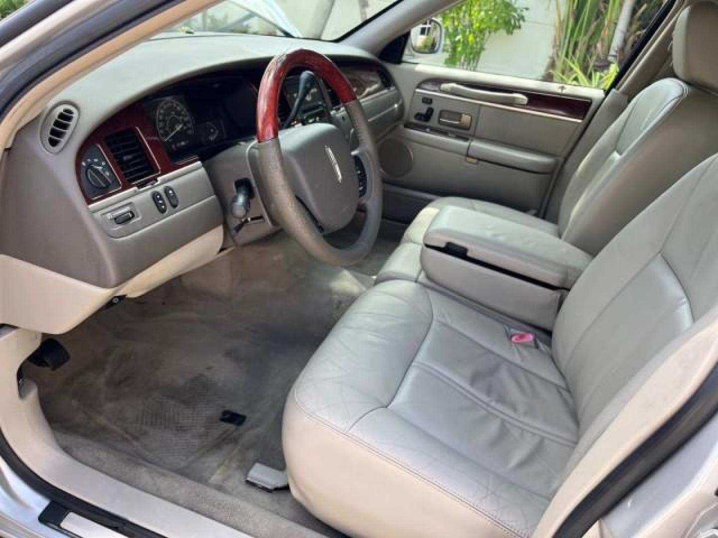 2005 Cashmere Tri-Coat /Shale/Dove Lincoln Town Car 1 FL Signature Limited LOW MILES 77,587 (1LNHM82W15Y) with an 4.6L SOHC SMPI V8 Engine engine, Automatic transmission, located at 4701 North Dixie Hwy, Pompano Beach, FL, 33064, (954) 422-2889, 26.240938, -80.123474 - OUR WEBPAGE FLORIDACARS1.COM HAS OVER 100 PHOTOS AND FREE CARFAX LINK 2005 LINCOLN TOWN CAR SIGNATURE LIMITED ROAD READY 4.6L V8 VIN: 1LNHM82W15Y640729 LOW MILES 77,587 SEDAN 4 DR NO RECALLS 4.6L V8 F OHV 16V 1 OWNER FLORIDA GASOLINE 32 SERVICE RECORDS POWER LEATHER SEATS REAR WHEEL DRIVE HEATED SEA - Photo#42