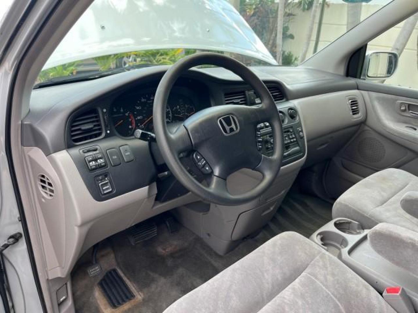 2002 Starlight Silver Metallic /Ivory Honda Odyssey 40 SERV EX LOW MILES 75,829 (2HKRL18612H) with an 3.5L SOHC MPFI 24-Valve VTEC V6 Engine engine, Automatic transmission, located at 4701 North Dixie Hwy, Pompano Beach, FL, 33064, (954) 422-2889, 26.240938, -80.123474 - OUR WEBPAGE FLORIDACARS1.COM HAS OVER 100 PHOTOS AND FREE CARFAX LINK 2002 HONDA ODYSSEY EX ROAD READY 3.5L V6 VIN: 2HKRL18612H522476 NO ACCIDENTS 25 MPG VAN LOW MILES 75,829 3.5L V6 F SOHC FLORIDA OWNER GASOLINE 3 ROW SEATS FRONT WHEEL DRIVE 40 SERVICE RECORDS POWER SLIDING DOORS 62,419 MILES Vehic - Photo#42