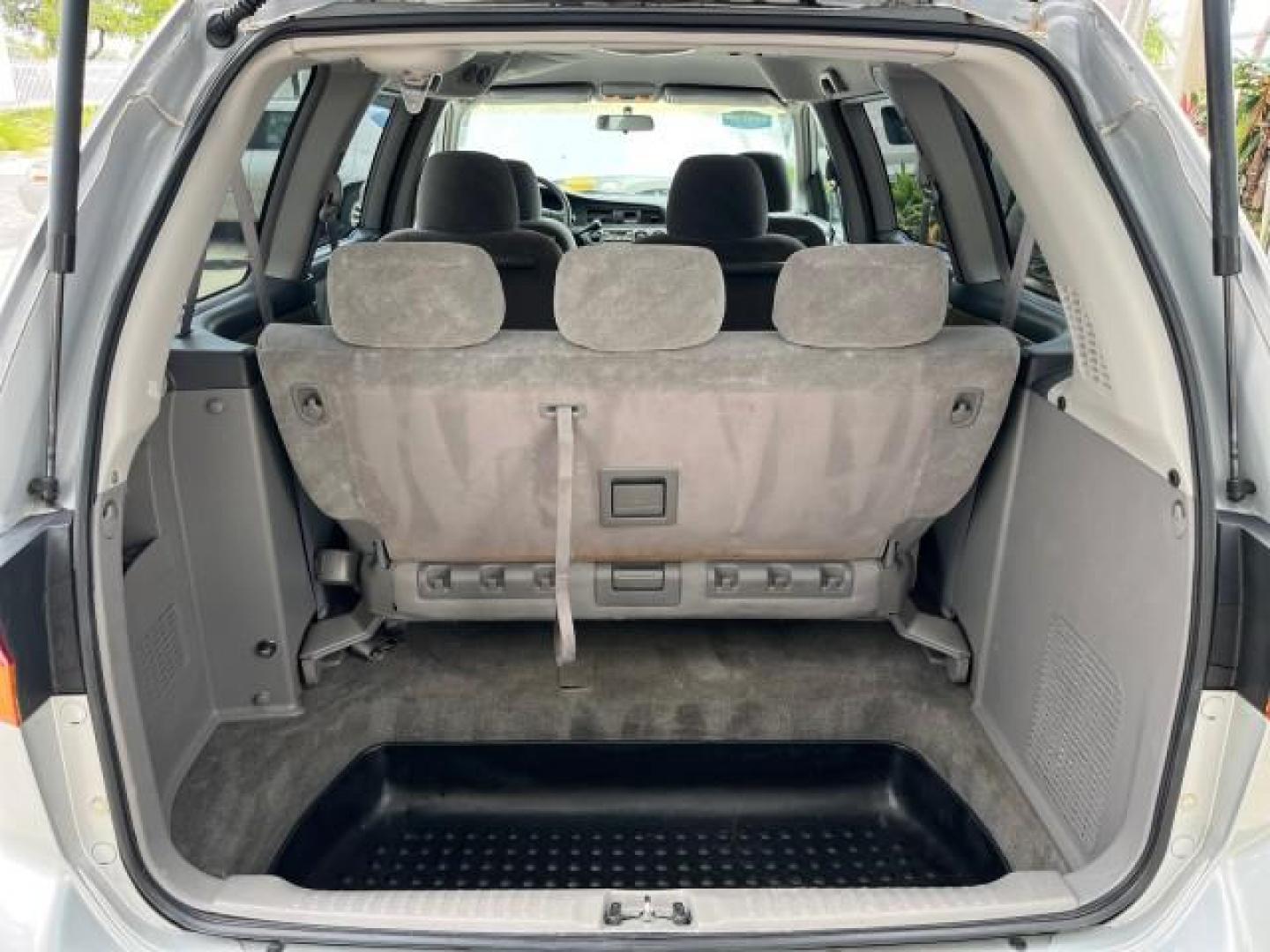 2002 Starlight Silver Metallic /Ivory Honda Odyssey 40 SERV EX LOW MILES 75,829 (2HKRL18612H) with an 3.5L SOHC MPFI 24-Valve VTEC V6 Engine engine, Automatic transmission, located at 4701 North Dixie Hwy, Pompano Beach, FL, 33064, (954) 422-2889, 26.240938, -80.123474 - OUR WEBPAGE FLORIDACARS1.COM HAS OVER 100 PHOTOS AND FREE CARFAX LINK 2002 HONDA ODYSSEY EX ROAD READY 3.5L V6 VIN: 2HKRL18612H522476 NO ACCIDENTS 25 MPG VAN LOW MILES 75,829 3.5L V6 F SOHC FLORIDA OWNER GASOLINE 3 ROW SEATS FRONT WHEEL DRIVE 40 SERVICE RECORDS POWER SLIDING DOORS 62,419 MILES Vehic - Photo#56