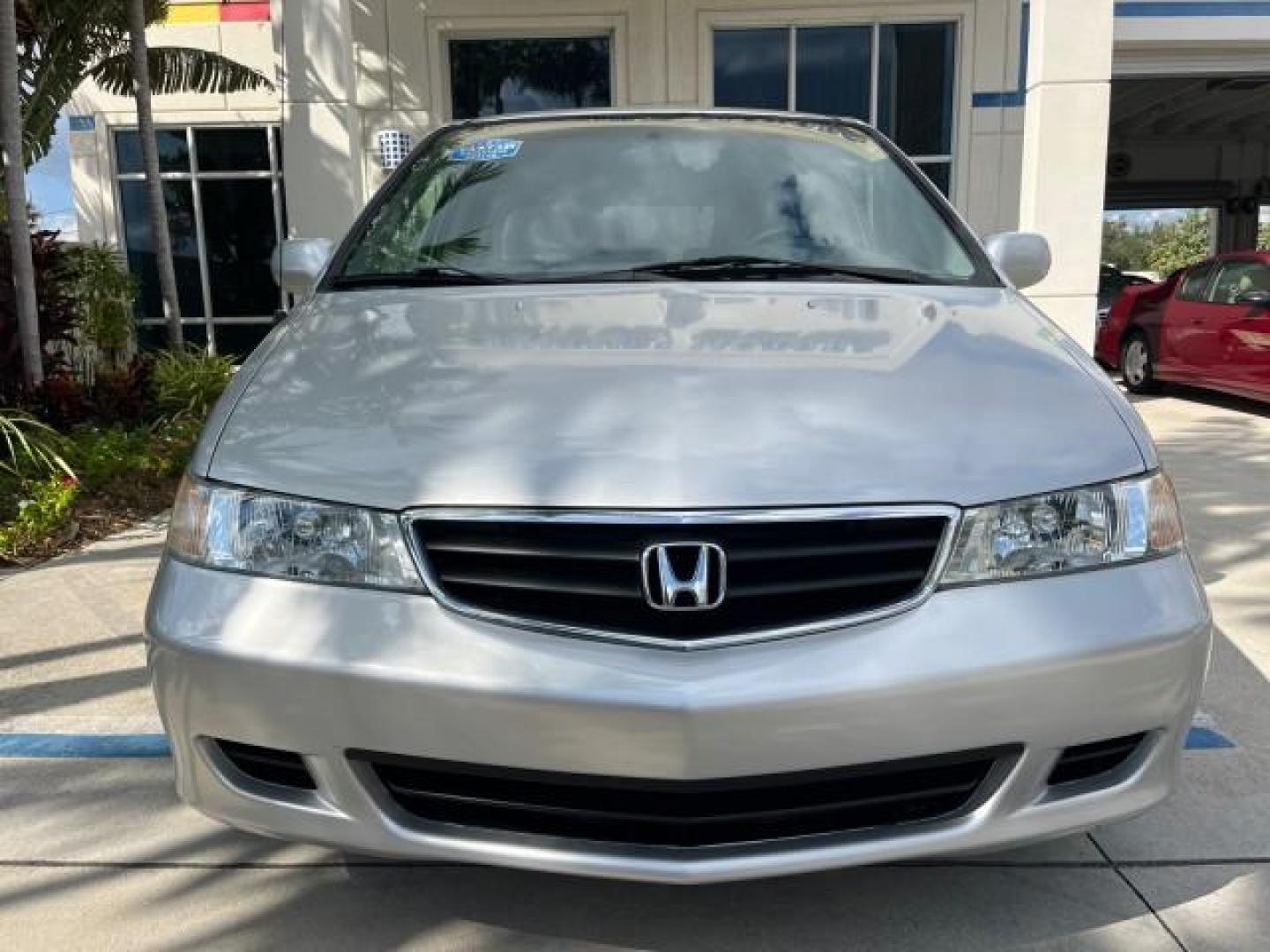 2002 Starlight Silver Metallic /Ivory Honda Odyssey 40 SERV EX LOW MILES 75,829 (2HKRL18612H) with an 3.5L SOHC MPFI 24-Valve VTEC V6 Engine engine, Automatic transmission, located at 4701 North Dixie Hwy, Pompano Beach, FL, 33064, (954) 422-2889, 26.240938, -80.123474 - OUR WEBPAGE FLORIDACARS1.COM HAS OVER 100 PHOTOS AND FREE CARFAX LINK 2002 HONDA ODYSSEY EX ROAD READY 3.5L V6 VIN: 2HKRL18612H522476 NO ACCIDENTS 25 MPG VAN LOW MILES 75,829 3.5L V6 F SOHC FLORIDA OWNER GASOLINE 3 ROW SEATS FRONT WHEEL DRIVE 40 SERVICE RECORDS POWER SLIDING DOORS 62,419 MILES Vehic - Photo#75