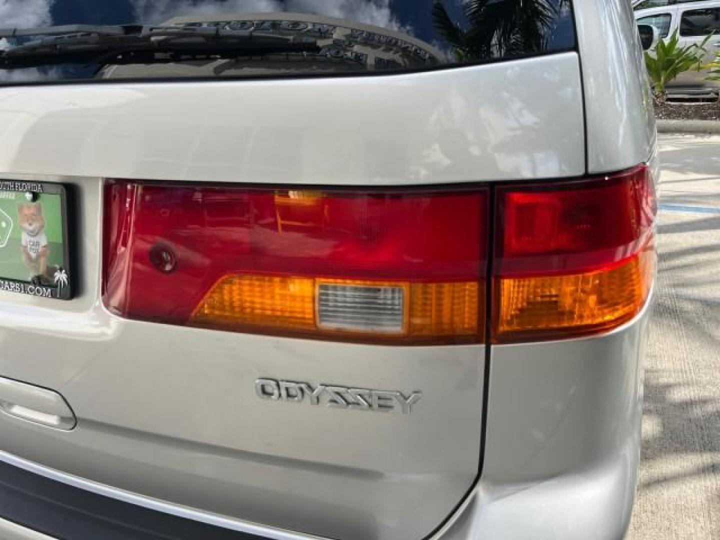 2002 Starlight Silver Metallic /Ivory Honda Odyssey 40 SERV EX LOW MILES 75,829 (2HKRL18612H) with an 3.5L SOHC MPFI 24-Valve VTEC V6 Engine engine, Automatic transmission, located at 4701 North Dixie Hwy, Pompano Beach, FL, 33064, (954) 422-2889, 26.240938, -80.123474 - OUR WEBPAGE FLORIDACARS1.COM HAS OVER 100 PHOTOS AND FREE CARFAX LINK 2002 HONDA ODYSSEY EX ROAD READY 3.5L V6 VIN: 2HKRL18612H522476 NO ACCIDENTS 25 MPG VAN LOW MILES 75,829 3.5L V6 F SOHC FLORIDA OWNER GASOLINE 3 ROW SEATS FRONT WHEEL DRIVE 40 SERVICE RECORDS POWER SLIDING DOORS 62,419 MILES Vehic - Photo#91