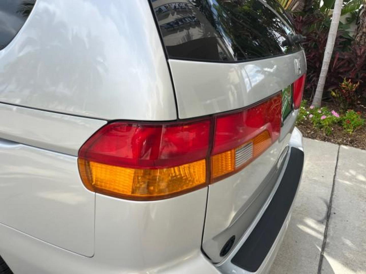 2002 Starlight Silver Metallic /Ivory Honda Odyssey 40 SERV EX LOW MILES 75,829 (2HKRL18612H) with an 3.5L SOHC MPFI 24-Valve VTEC V6 Engine engine, Automatic transmission, located at 4701 North Dixie Hwy, Pompano Beach, FL, 33064, (954) 422-2889, 26.240938, -80.123474 - OUR WEBPAGE FLORIDACARS1.COM HAS OVER 100 PHOTOS AND FREE CARFAX LINK 2002 HONDA ODYSSEY EX ROAD READY 3.5L V6 VIN: 2HKRL18612H522476 NO ACCIDENTS 25 MPG VAN LOW MILES 75,829 3.5L V6 F SOHC FLORIDA OWNER GASOLINE 3 ROW SEATS FRONT WHEEL DRIVE 40 SERVICE RECORDS POWER SLIDING DOORS 62,419 MILES Vehic - Photo#95