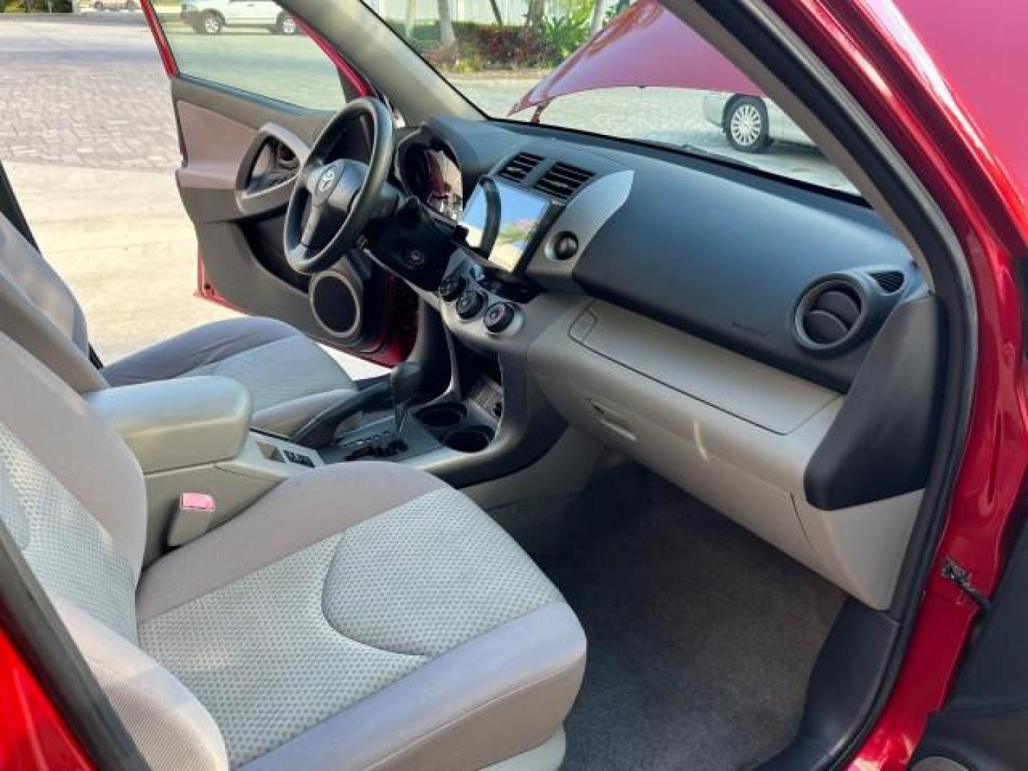 2007 Barcelona Red Metallic /Ash Toyota RAV4 SUV FL LOW MILES 58,784 (JTMZD33V175) with an 2.4L DOHC SFI 16-Valve VVT-i 4-Cyl Engine engine, Automatic transmission, located at 4701 North Dixie Hwy, Pompano Beach, FL, 33064, (954) 422-2889, 26.240938, -80.123474 - OUR WEBPAGE FLORIDACARS1.COM HAS OVER 100 PHOTOS AND FREE CARFAX LINK 2007 TOYOTA RAV4 ROAD READY 2.4L I4 VIN: JTMZD33V175058197 NO RECALLS 30 MPG 4 DOOR WAGON/SPORT UTILITY FLORIDA OWNER 2.4L I4 F DOHC 16V BLUETOOTH LOW MILES 58,784 GASOLINE NAVIGATION 15 SERVICE RECORDS FRONT WHEEL DRIVE BACK UP C - Photo#26