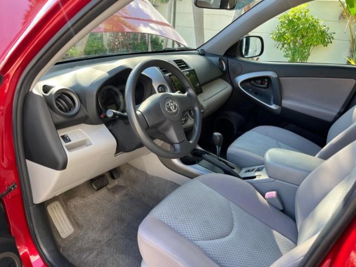 2007 Barcelona Red Metallic /Ash Toyota RAV4 SUV FL LOW MILES 58,784 (JTMZD33V175) with an 2.4L DOHC SFI 16-Valve VVT-i 4-Cyl Engine engine, Automatic transmission, located at 4701 North Dixie Hwy, Pompano Beach, FL, 33064, (954) 422-2889, 26.240938, -80.123474 - OUR WEBPAGE FLORIDACARS1.COM HAS OVER 100 PHOTOS AND FREE CARFAX LINK 2007 TOYOTA RAV4 ROAD READY 2.4L I4 VIN: JTMZD33V175058197 NO RECALLS 30 MPG 4 DOOR WAGON/SPORT UTILITY FLORIDA OWNER 2.4L I4 F DOHC 16V BLUETOOTH LOW MILES 58,784 GASOLINE NAVIGATION 15 SERVICE RECORDS FRONT WHEEL DRIVE BACK UP C - Photo#43