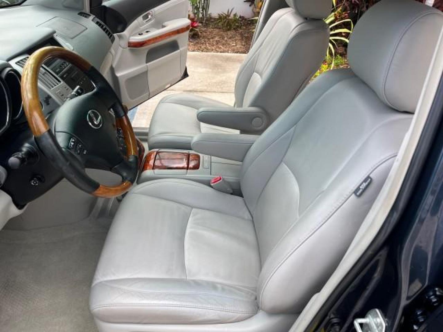 2007 Neptune Blue Mica /Light Gray Lexus RX 350 1 FL LOW MILES 67,914 (2T2GK31U57C) with an 3.5L DOHC SMPI 24-Valve V6 Engine engine, Automatic transmission, located at 4701 North Dixie Hwy, Pompano Beach, FL, 33064, (954) 422-2889, 26.240938, -80.123474 - OUR WEBPAGE FLORIDACARS1.COM HAS OVER 100 PHOTOS AND FREE CARFAX LINK 2007 LEXUS RX 350 NEW $44,434 ROAD READY VIN: 2T2GK31U57C023457 NO ACCIDENTS NO RECALLS DOOR WAGON/SPORT UTILITY 1 OWNER FLORIDA 3.5L V6 3.5L V6 F DOHC 24V LOW MILES 68,914 25 MPG GASOLINE POWER LEATHER SEATS FRONT WHEEL DRIVE POW - Photo#10