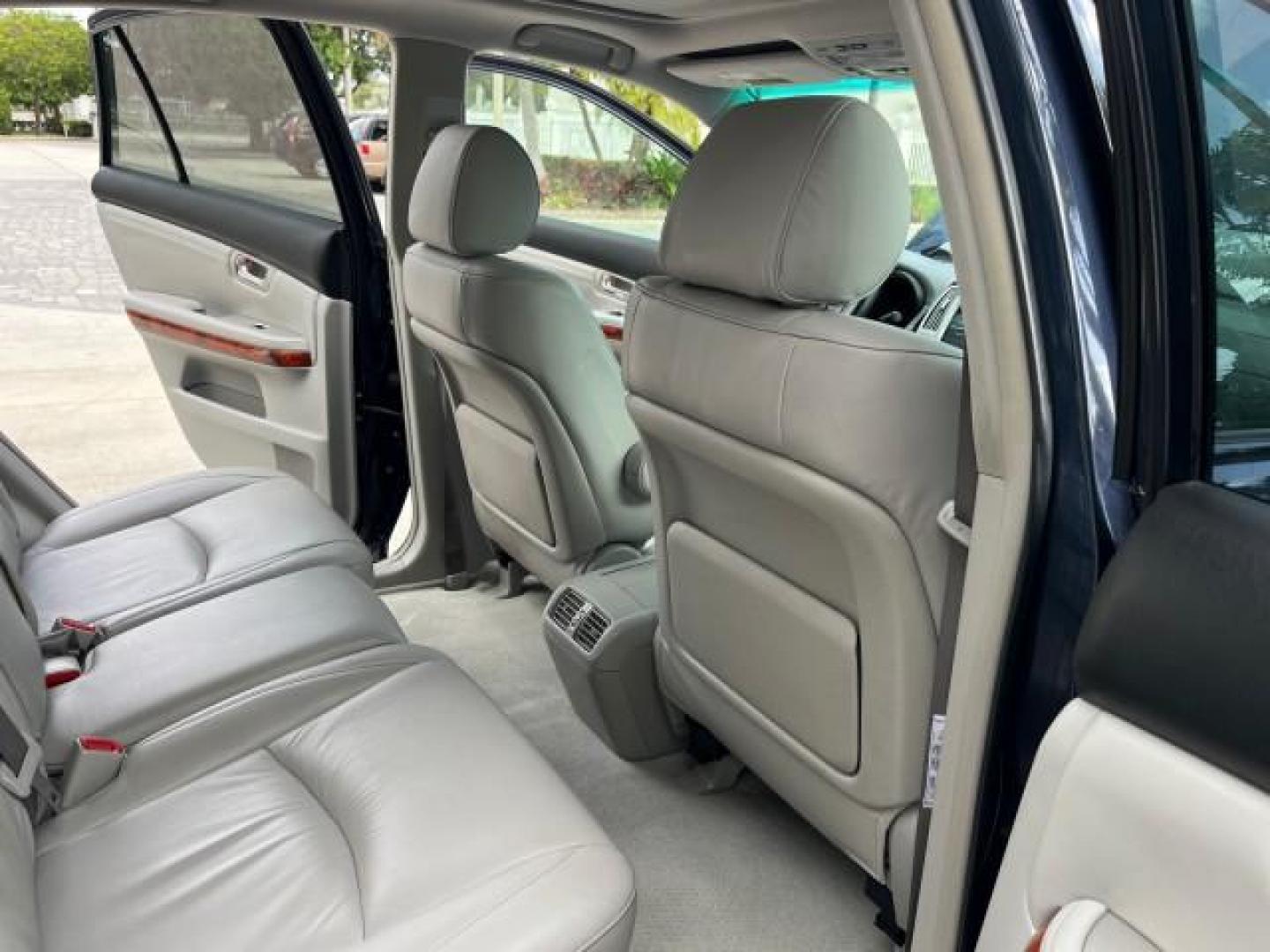 2007 Neptune Blue Mica /Light Gray Lexus RX 350 1 FL LOW MILES 67,914 (2T2GK31U57C) with an 3.5L DOHC SMPI 24-Valve V6 Engine engine, Automatic transmission, located at 4701 North Dixie Hwy, Pompano Beach, FL, 33064, (954) 422-2889, 26.240938, -80.123474 - OUR WEBPAGE FLORIDACARS1.COM HAS OVER 100 PHOTOS AND FREE CARFAX LINK 2007 LEXUS RX 350 NEW $44,434 ROAD READY VIN: 2T2GK31U57C023457 NO ACCIDENTS NO RECALLS DOOR WAGON/SPORT UTILITY 1 OWNER FLORIDA 3.5L V6 3.5L V6 F DOHC 24V LOW MILES 68,914 25 MPG GASOLINE POWER LEATHER SEATS FRONT WHEEL DRIVE POW - Photo#30