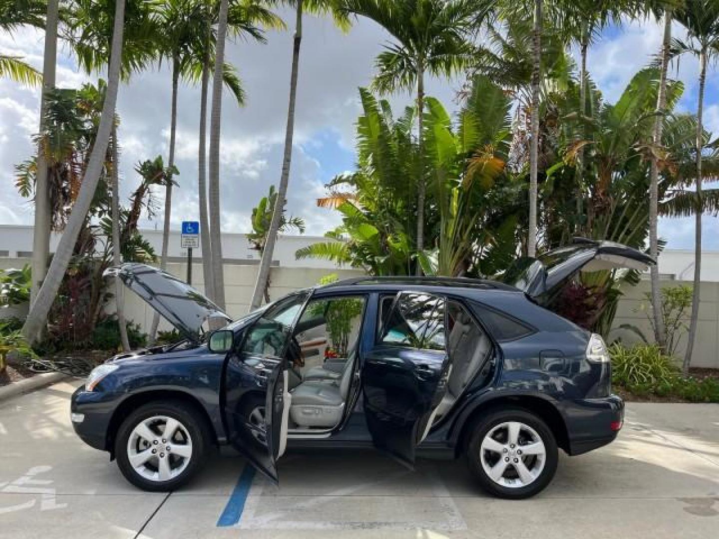 2007 Neptune Blue Mica /Light Gray Lexus RX 350 1 FL LOW MILES 67,914 (2T2GK31U57C) with an 3.5L DOHC SMPI 24-Valve V6 Engine engine, Automatic transmission, located at 4701 North Dixie Hwy, Pompano Beach, FL, 33064, (954) 422-2889, 26.240938, -80.123474 - OUR WEBPAGE FLORIDACARS1.COM HAS OVER 100 PHOTOS AND FREE CARFAX LINK 2007 LEXUS RX 350 NEW $44,434 ROAD READY VIN: 2T2GK31U57C023457 NO ACCIDENTS NO RECALLS DOOR WAGON/SPORT UTILITY 1 OWNER FLORIDA 3.5L V6 3.5L V6 F DOHC 24V LOW MILES 68,914 25 MPG GASOLINE POWER LEATHER SEATS FRONT WHEEL DRIVE POW - Photo#8