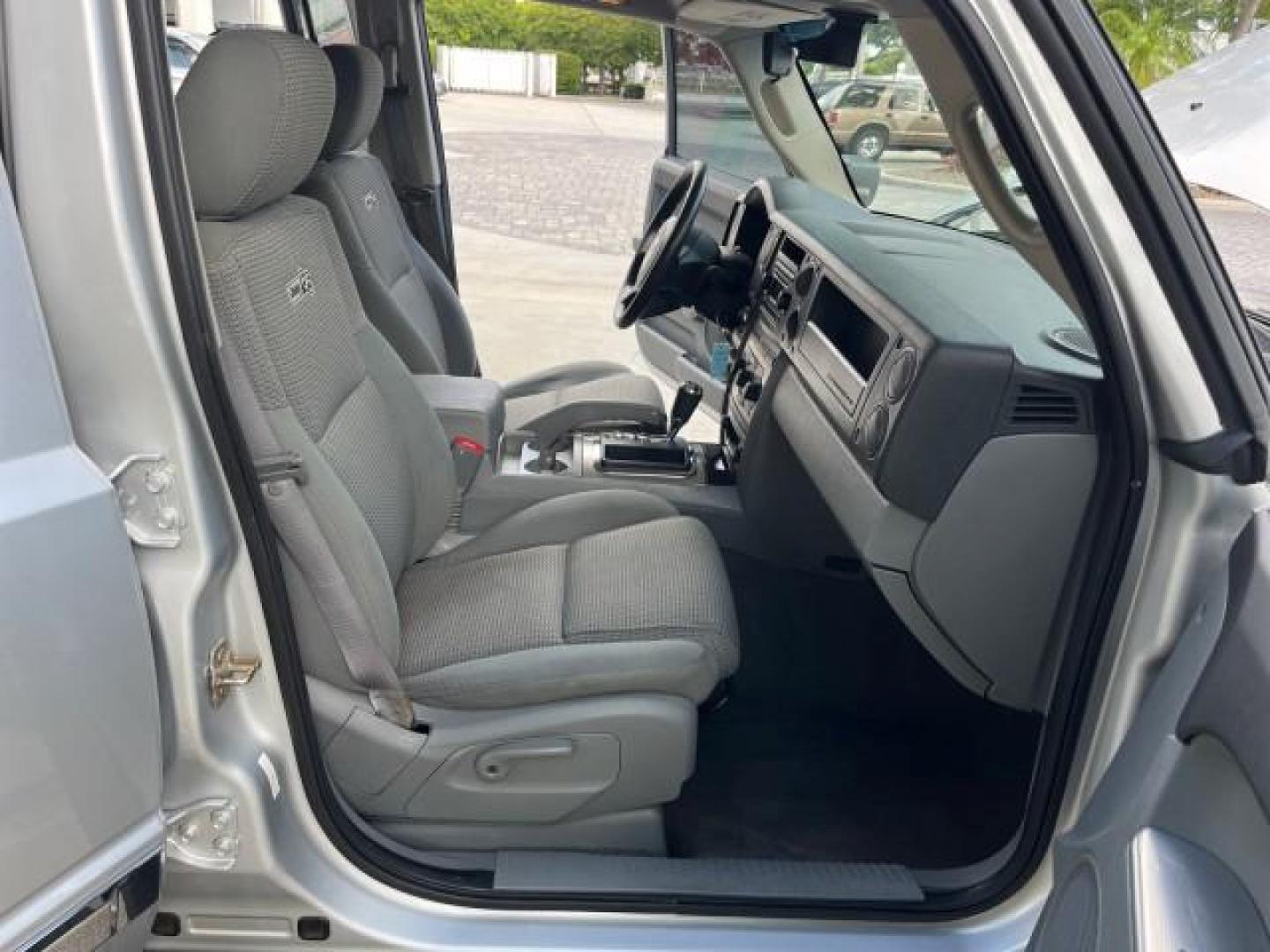 2006 Bright Silver Metallic /Slate Gray/Lt Graystone Jeep Commander 4WD LOW MILES 68,212 (1J8HG48K06C) with an 3.7L V6 Engine engine, Automatic transmission, located at 4701 North Dixie Hwy, Pompano Beach, FL, 33064, (954) 422-2889, 26.240938, -80.123474 - OUR WEBPAGE FLORIDACARS1.COM HAS OVER 100 PHOTOS AND FREE CARFAX LINK 2006 JEEP COMMANDER ROAD READY 3.7L V6 VIN: 1J8HG48K06C364916 NO ACCIDENTS 4X4 4 DOOR WAGON/SPORT UTILITY LOW MILES 68,212 3.7L V6 F POWER SEATS AWD GASOLINE 3 ROW SEATS 3 SUNROOFS REAR WHEEL DRIVE W/ 4X4 PARK SENSORS 18 SERVICE R - Photo#12