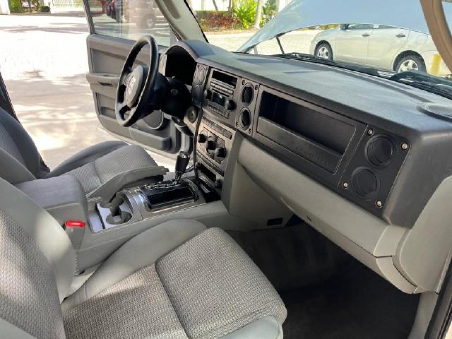 2006 Bright Silver Metallic /Slate Gray/Lt Graystone Jeep Commander 4WD LOW MILES 68,212 (1J8HG48K06C) with an 3.7L V6 Engine engine, Automatic transmission, located at 4701 North Dixie Hwy, Pompano Beach, FL, 33064, (954) 422-2889, 26.240938, -80.123474 - OUR WEBPAGE FLORIDACARS1.COM HAS OVER 100 PHOTOS AND FREE CARFAX LINK 2006 JEEP COMMANDER ROAD READY 3.7L V6 VIN: 1J8HG48K06C364916 NO ACCIDENTS 4X4 4 DOOR WAGON/SPORT UTILITY LOW MILES 68,212 3.7L V6 F POWER SEATS AWD GASOLINE 3 ROW SEATS 3 SUNROOFS REAR WHEEL DRIVE W/ 4X4 PARK SENSORS 18 SERVICE R - Photo#27