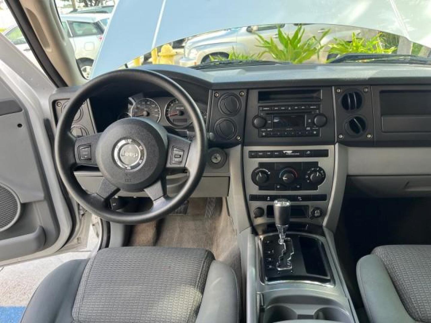 2006 Bright Silver Metallic /Slate Gray/Lt Graystone Jeep Commander 4WD LOW MILES 68,212 (1J8HG48K06C) with an 3.7L V6 Engine engine, Automatic transmission, located at 4701 North Dixie Hwy, Pompano Beach, FL, 33064, (954) 422-2889, 26.240938, -80.123474 - OUR WEBPAGE FLORIDACARS1.COM HAS OVER 100 PHOTOS AND FREE CARFAX LINK 2006 JEEP COMMANDER ROAD READY 3.7L V6 VIN: 1J8HG48K06C364916 NO ACCIDENTS 4X4 4 DOOR WAGON/SPORT UTILITY LOW MILES 68,212 3.7L V6 F POWER SEATS AWD GASOLINE 3 ROW SEATS 3 SUNROOFS REAR WHEEL DRIVE W/ 4X4 PARK SENSORS 18 SERVICE R - Photo#36