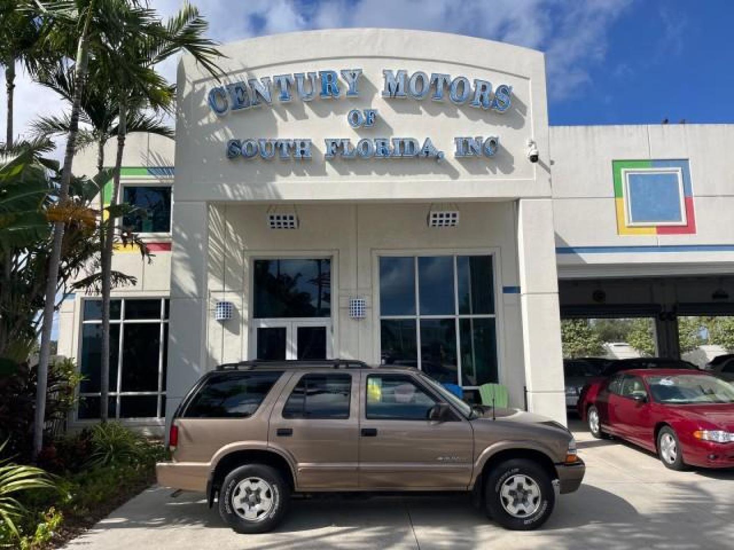 2004 Sandalwood Metallic /Medium Gray Chevrolet Blazer 4WD LS LOW MILES 85,272 (1GNDT13X54K) with an 4.3L Vortec 4300 V6 MFI Engine engine, Automatic transmission, located at 4701 North Dixie Hwy, Pompano Beach, FL, 33064, (954) 422-2889, 26.240938, -80.123474 - OUR WEBPAGE FLORIDACARS1.COM HAS OVER 100 PHOTOS AND FREE CARFAX LINK 2004 CHEVROLET BLAZER LS ROAD READY 4.3L V6 VIN: 1GNDT13X54K147505 NO ACCIDENTS 4 DOOR WAGON/SPORT UTILITY NO RECALLS 4X4 4.3L V6 F LOW MILES 85,272 GASOLINE 30 SERVICE RECORDS REAR WHEEL DRIVE W/ 4X4 4WD ON DEMAND 4WD Alloy Wheel - Photo#0