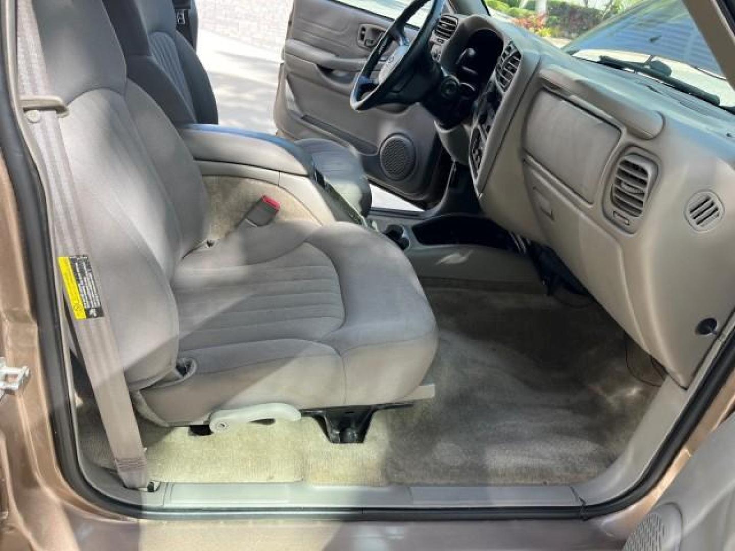 2004 Sandalwood Metallic /Medium Gray Chevrolet Blazer 4WD LS LOW MILES 85,272 (1GNDT13X54K) with an 4.3L Vortec 4300 V6 MFI Engine engine, Automatic transmission, located at 4701 North Dixie Hwy, Pompano Beach, FL, 33064, (954) 422-2889, 26.240938, -80.123474 - OUR WEBPAGE FLORIDACARS1.COM HAS OVER 100 PHOTOS AND FREE CARFAX LINK 2004 CHEVROLET BLAZER LS ROAD READY 4.3L V6 VIN: 1GNDT13X54K147505 NO ACCIDENTS 4 DOOR WAGON/SPORT UTILITY NO RECALLS 4X4 4.3L V6 F LOW MILES 85,272 GASOLINE 30 SERVICE RECORDS REAR WHEEL DRIVE W/ 4X4 4WD ON DEMAND 4WD Alloy Wheel - Photo#25