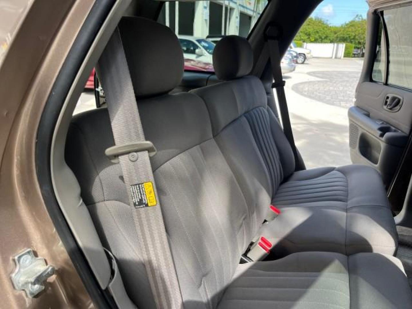 2004 Sandalwood Metallic /Medium Gray Chevrolet Blazer 4WD LS LOW MILES 85,272 (1GNDT13X54K) with an 4.3L Vortec 4300 V6 MFI Engine engine, Automatic transmission, located at 4701 North Dixie Hwy, Pompano Beach, FL, 33064, (954) 422-2889, 26.240938, -80.123474 - OUR WEBPAGE FLORIDACARS1.COM HAS OVER 100 PHOTOS AND FREE CARFAX LINK 2004 CHEVROLET BLAZER LS ROAD READY 4.3L V6 VIN: 1GNDT13X54K147505 NO ACCIDENTS 4 DOOR WAGON/SPORT UTILITY NO RECALLS 4X4 4.3L V6 F LOW MILES 85,272 GASOLINE 30 SERVICE RECORDS REAR WHEEL DRIVE W/ 4X4 4WD ON DEMAND 4WD Alloy Wheel - Photo#31