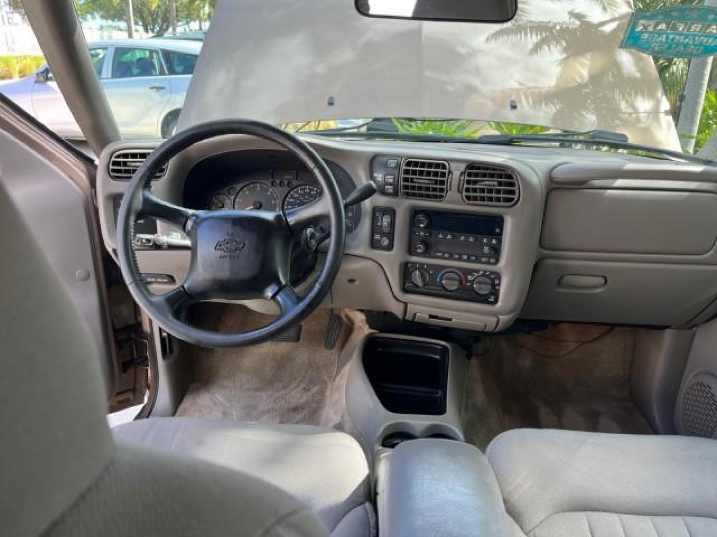 2004 Sandalwood Metallic /Medium Gray Chevrolet Blazer 4WD LS LOW MILES 85,272 (1GNDT13X54K) with an 4.3L Vortec 4300 V6 MFI Engine engine, Automatic transmission, located at 4701 North Dixie Hwy, Pompano Beach, FL, 33064, (954) 422-2889, 26.240938, -80.123474 - OUR WEBPAGE FLORIDACARS1.COM HAS OVER 100 PHOTOS AND FREE CARFAX LINK 2004 CHEVROLET BLAZER LS ROAD READY 4.3L V6 VIN: 1GNDT13X54K147505 NO ACCIDENTS 4 DOOR WAGON/SPORT UTILITY NO RECALLS 4X4 4.3L V6 F LOW MILES 85,272 GASOLINE 30 SERVICE RECORDS REAR WHEEL DRIVE W/ 4X4 4WD ON DEMAND 4WD Alloy Wheel - Photo#35