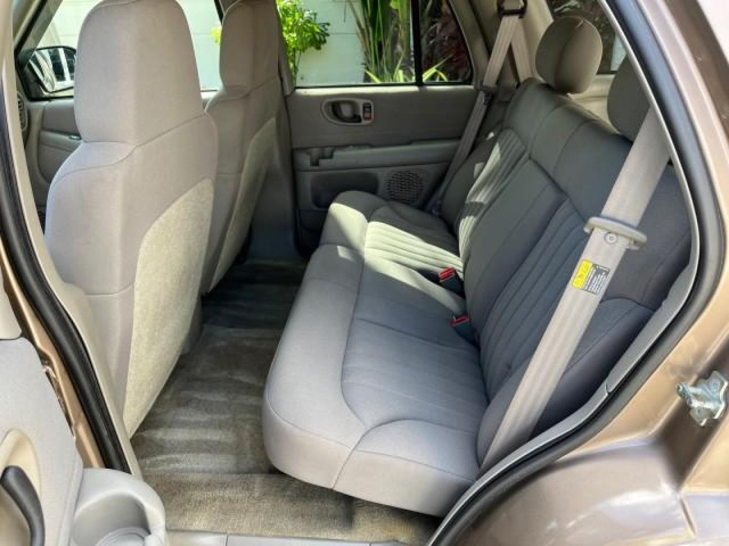 2004 Sandalwood Metallic /Medium Gray Chevrolet Blazer 4WD LS LOW MILES 85,272 (1GNDT13X54K) with an 4.3L Vortec 4300 V6 MFI Engine engine, Automatic transmission, located at 4701 North Dixie Hwy, Pompano Beach, FL, 33064, (954) 422-2889, 26.240938, -80.123474 - OUR WEBPAGE FLORIDACARS1.COM HAS OVER 100 PHOTOS AND FREE CARFAX LINK 2004 CHEVROLET BLAZER LS ROAD READY 4.3L V6 VIN: 1GNDT13X54K147505 NO ACCIDENTS 4 DOOR WAGON/SPORT UTILITY NO RECALLS 4X4 4.3L V6 F LOW MILES 85,272 GASOLINE 30 SERVICE RECORDS REAR WHEEL DRIVE W/ 4X4 4WD ON DEMAND 4WD Alloy Wheel - Photo#37