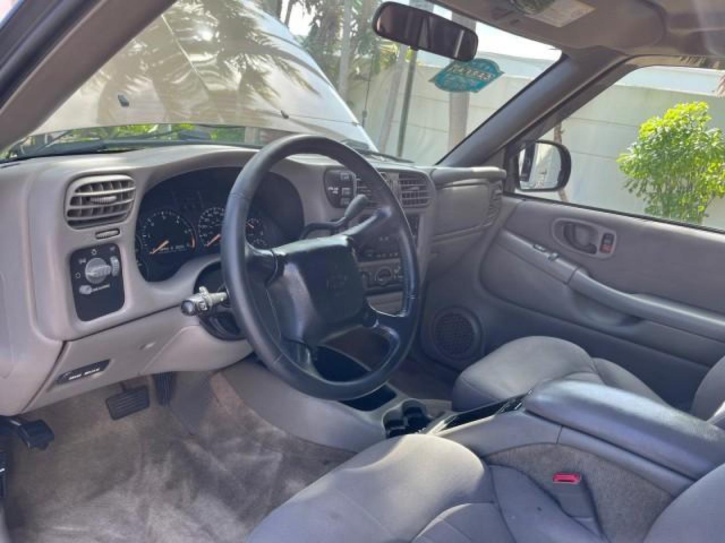 2004 Sandalwood Metallic /Medium Gray Chevrolet Blazer 4WD LS LOW MILES 85,272 (1GNDT13X54K) with an 4.3L Vortec 4300 V6 MFI Engine engine, Automatic transmission, located at 4701 North Dixie Hwy, Pompano Beach, FL, 33064, (954) 422-2889, 26.240938, -80.123474 - OUR WEBPAGE FLORIDACARS1.COM HAS OVER 100 PHOTOS AND FREE CARFAX LINK 2004 CHEVROLET BLAZER LS ROAD READY 4.3L V6 VIN: 1GNDT13X54K147505 NO ACCIDENTS 4 DOOR WAGON/SPORT UTILITY NO RECALLS 4X4 4.3L V6 F LOW MILES 85,272 GASOLINE 30 SERVICE RECORDS REAR WHEEL DRIVE W/ 4X4 4WD ON DEMAND 4WD Alloy Wheel - Photo#40