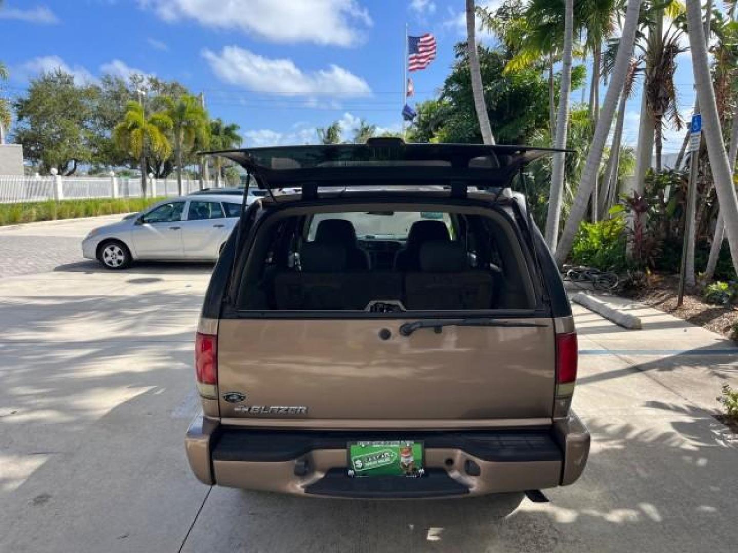 2004 Sandalwood Metallic /Medium Gray Chevrolet Blazer 4WD LS LOW MILES 85,272 (1GNDT13X54K) with an 4.3L Vortec 4300 V6 MFI Engine engine, Automatic transmission, located at 4701 North Dixie Hwy, Pompano Beach, FL, 33064, (954) 422-2889, 26.240938, -80.123474 - OUR WEBPAGE FLORIDACARS1.COM HAS OVER 100 PHOTOS AND FREE CARFAX LINK 2004 CHEVROLET BLAZER LS ROAD READY 4.3L V6 VIN: 1GNDT13X54K147505 NO ACCIDENTS 4 DOOR WAGON/SPORT UTILITY NO RECALLS 4X4 4.3L V6 F LOW MILES 85,272 GASOLINE 30 SERVICE RECORDS REAR WHEEL DRIVE W/ 4X4 4WD ON DEMAND 4WD Alloy Wheel - Photo#58