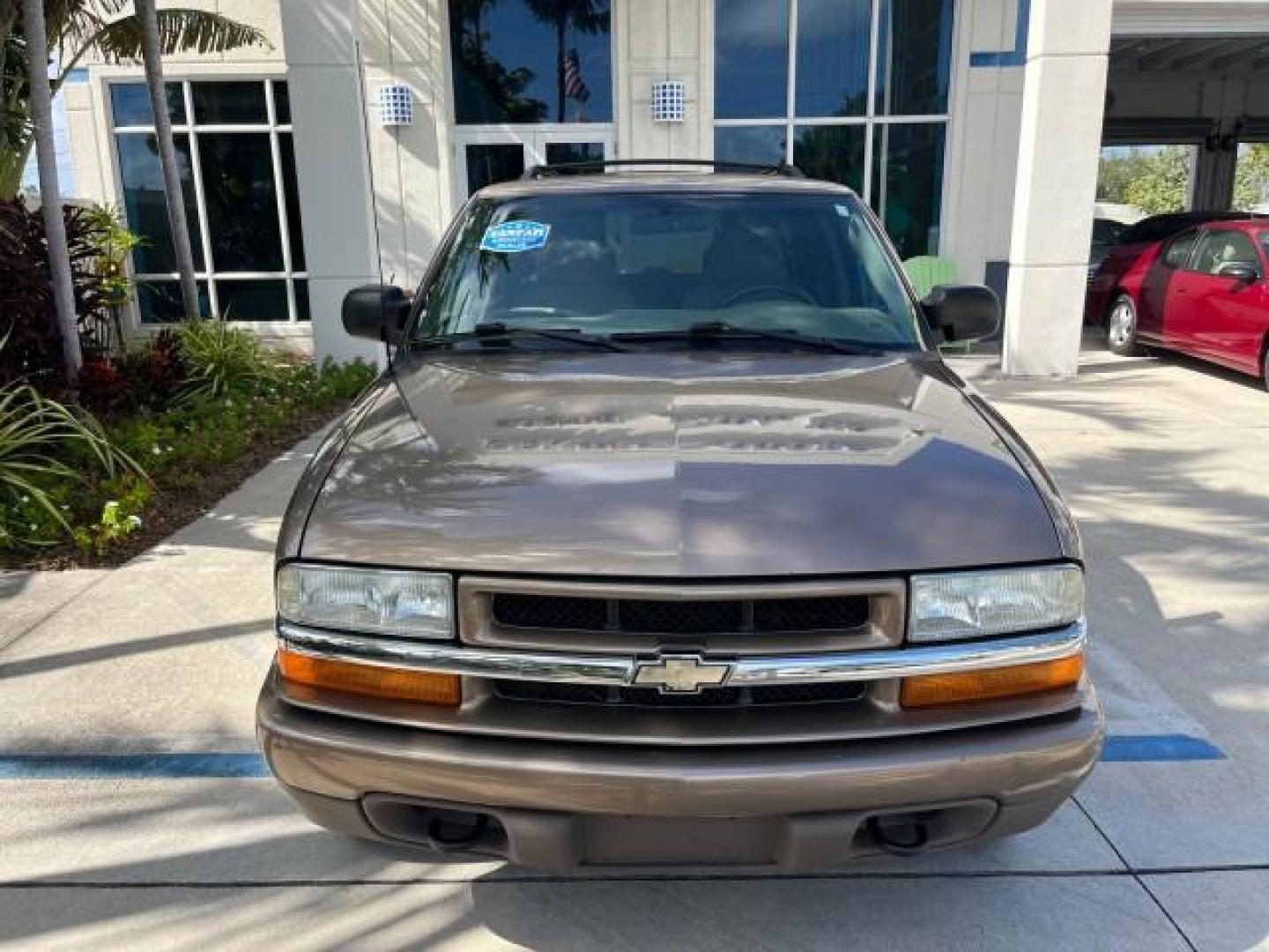 2004 Sandalwood Metallic /Medium Gray Chevrolet Blazer 4WD LS LOW MILES 85,272 (1GNDT13X54K) with an 4.3L Vortec 4300 V6 MFI Engine engine, Automatic transmission, located at 4701 North Dixie Hwy, Pompano Beach, FL, 33064, (954) 422-2889, 26.240938, -80.123474 - OUR WEBPAGE FLORIDACARS1.COM HAS OVER 100 PHOTOS AND FREE CARFAX LINK 2004 CHEVROLET BLAZER LS ROAD READY 4.3L V6 VIN: 1GNDT13X54K147505 NO ACCIDENTS 4 DOOR WAGON/SPORT UTILITY NO RECALLS 4X4 4.3L V6 F LOW MILES 85,272 GASOLINE 30 SERVICE RECORDS REAR WHEEL DRIVE W/ 4X4 4WD ON DEMAND 4WD Alloy Wheel - Photo#65