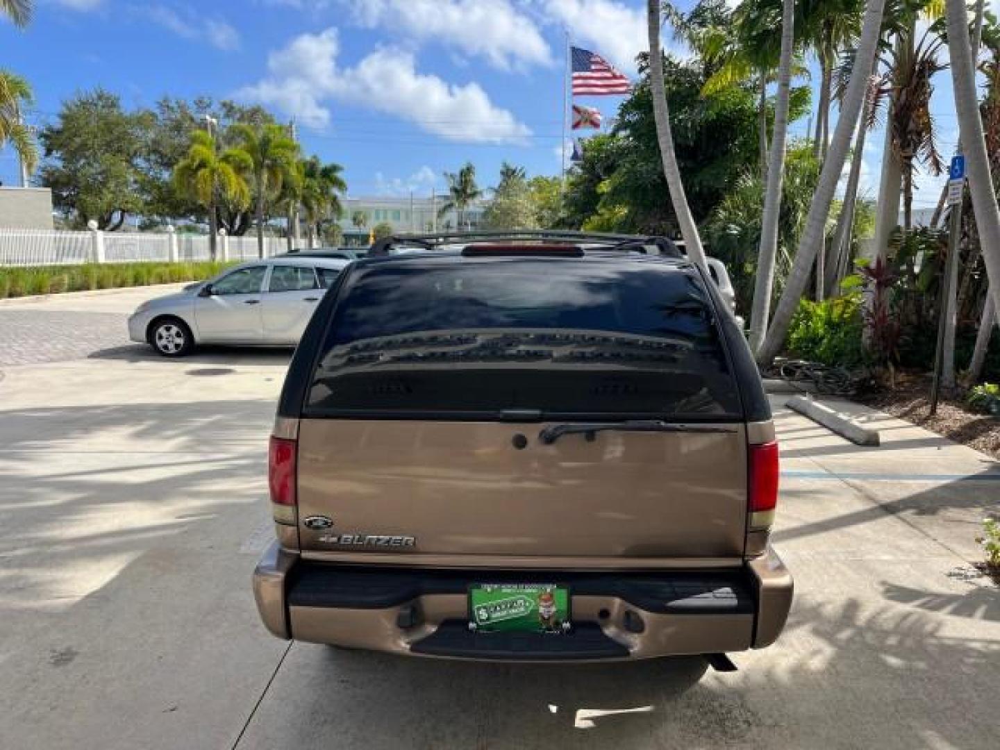 2004 Sandalwood Metallic /Medium Gray Chevrolet Blazer 4WD LS LOW MILES 85,272 (1GNDT13X54K) with an 4.3L Vortec 4300 V6 MFI Engine engine, Automatic transmission, located at 4701 North Dixie Hwy, Pompano Beach, FL, 33064, (954) 422-2889, 26.240938, -80.123474 - OUR WEBPAGE FLORIDACARS1.COM HAS OVER 100 PHOTOS AND FREE CARFAX LINK 2004 CHEVROLET BLAZER LS ROAD READY 4.3L V6 VIN: 1GNDT13X54K147505 NO ACCIDENTS 4 DOOR WAGON/SPORT UTILITY NO RECALLS 4X4 4.3L V6 F LOW MILES 85,272 GASOLINE 30 SERVICE RECORDS REAR WHEEL DRIVE W/ 4X4 4WD ON DEMAND 4WD Alloy Wheel - Photo#6