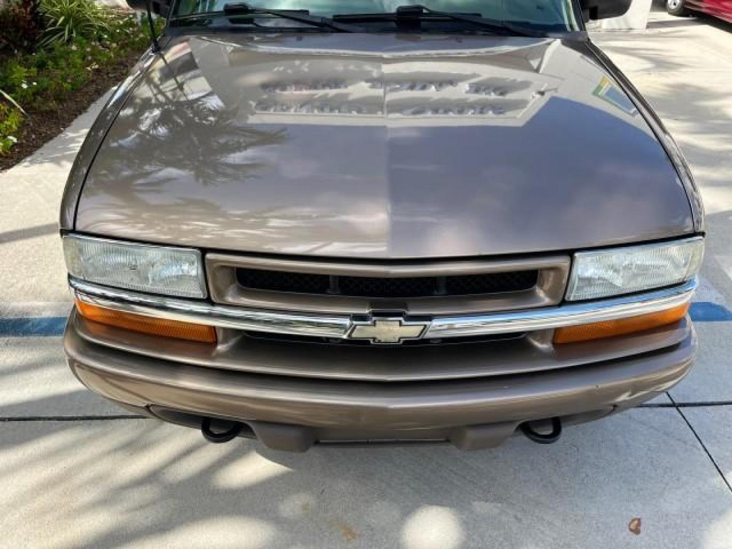 2004 Sandalwood Metallic /Medium Gray Chevrolet Blazer 4WD LS LOW MILES 85,272 (1GNDT13X54K) with an 4.3L Vortec 4300 V6 MFI Engine engine, Automatic transmission, located at 4701 North Dixie Hwy, Pompano Beach, FL, 33064, (954) 422-2889, 26.240938, -80.123474 - OUR WEBPAGE FLORIDACARS1.COM HAS OVER 100 PHOTOS AND FREE CARFAX LINK 2004 CHEVROLET BLAZER LS ROAD READY 4.3L V6 VIN: 1GNDT13X54K147505 NO ACCIDENTS 4 DOOR WAGON/SPORT UTILITY NO RECALLS 4X4 4.3L V6 F LOW MILES 85,272 GASOLINE 30 SERVICE RECORDS REAR WHEEL DRIVE W/ 4X4 4WD ON DEMAND 4WD Alloy Wheel - Photo#72