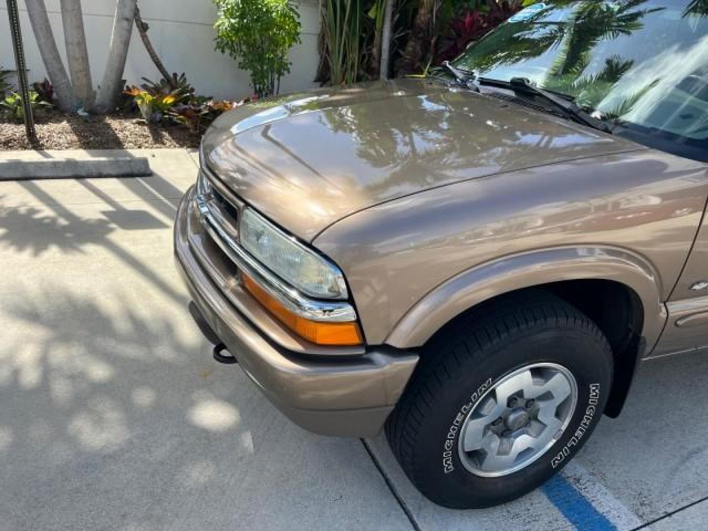 2004 Sandalwood Metallic /Medium Gray Chevrolet Blazer 4WD LS LOW MILES 85,272 (1GNDT13X54K) with an 4.3L Vortec 4300 V6 MFI Engine engine, Automatic transmission, located at 4701 North Dixie Hwy, Pompano Beach, FL, 33064, (954) 422-2889, 26.240938, -80.123474 - OUR WEBPAGE FLORIDACARS1.COM HAS OVER 100 PHOTOS AND FREE CARFAX LINK 2004 CHEVROLET BLAZER LS ROAD READY 4.3L V6 VIN: 1GNDT13X54K147505 NO ACCIDENTS 4 DOOR WAGON/SPORT UTILITY NO RECALLS 4X4 4.3L V6 F LOW MILES 85,272 GASOLINE 30 SERVICE RECORDS REAR WHEEL DRIVE W/ 4X4 4WD ON DEMAND 4WD Alloy Wheel - Photo#74