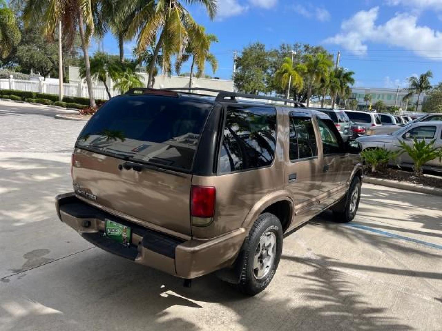 2004 Sandalwood Metallic /Medium Gray Chevrolet Blazer 4WD LS LOW MILES 85,272 (1GNDT13X54K) with an 4.3L Vortec 4300 V6 MFI Engine engine, Automatic transmission, located at 4701 North Dixie Hwy, Pompano Beach, FL, 33064, (954) 422-2889, 26.240938, -80.123474 - OUR WEBPAGE FLORIDACARS1.COM HAS OVER 100 PHOTOS AND FREE CARFAX LINK 2004 CHEVROLET BLAZER LS ROAD READY 4.3L V6 VIN: 1GNDT13X54K147505 NO ACCIDENTS 4 DOOR WAGON/SPORT UTILITY NO RECALLS 4X4 4.3L V6 F LOW MILES 85,272 GASOLINE 30 SERVICE RECORDS REAR WHEEL DRIVE W/ 4X4 4WD ON DEMAND 4WD Alloy Wheel - Photo#7