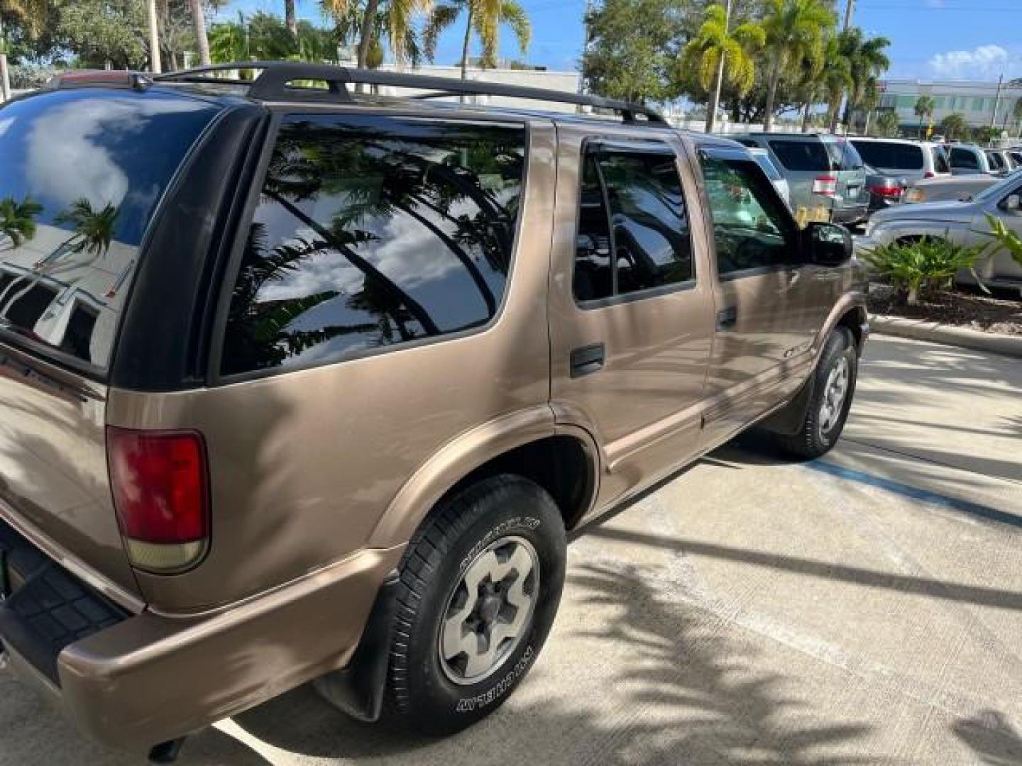 2004 Sandalwood Metallic /Medium Gray Chevrolet Blazer 4WD LS LOW MILES 85,272 (1GNDT13X54K) with an 4.3L Vortec 4300 V6 MFI Engine engine, Automatic transmission, located at 4701 North Dixie Hwy, Pompano Beach, FL, 33064, (954) 422-2889, 26.240938, -80.123474 - OUR WEBPAGE FLORIDACARS1.COM HAS OVER 100 PHOTOS AND FREE CARFAX LINK 2004 CHEVROLET BLAZER LS ROAD READY 4.3L V6 VIN: 1GNDT13X54K147505 NO ACCIDENTS 4 DOOR WAGON/SPORT UTILITY NO RECALLS 4X4 4.3L V6 F LOW MILES 85,272 GASOLINE 30 SERVICE RECORDS REAR WHEEL DRIVE W/ 4X4 4WD ON DEMAND 4WD Alloy Wheel - Photo#86