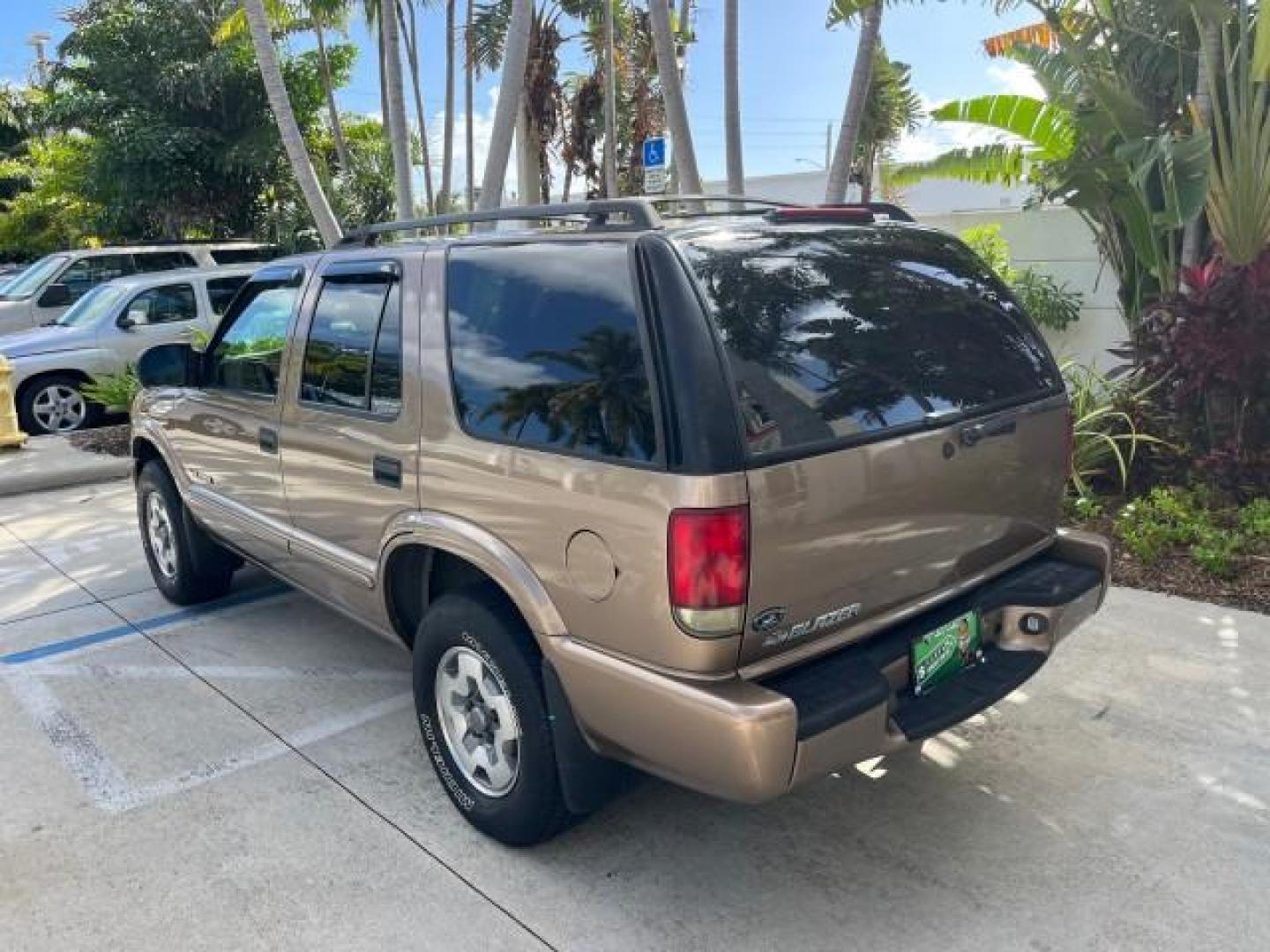 2004 Sandalwood Metallic /Medium Gray Chevrolet Blazer 4WD LS LOW MILES 85,272 (1GNDT13X54K) with an 4.3L Vortec 4300 V6 MFI Engine engine, Automatic transmission, located at 4701 North Dixie Hwy, Pompano Beach, FL, 33064, (954) 422-2889, 26.240938, -80.123474 - OUR WEBPAGE FLORIDACARS1.COM HAS OVER 100 PHOTOS AND FREE CARFAX LINK 2004 CHEVROLET BLAZER LS ROAD READY 4.3L V6 VIN: 1GNDT13X54K147505 NO ACCIDENTS 4 DOOR WAGON/SPORT UTILITY NO RECALLS 4X4 4.3L V6 F LOW MILES 85,272 GASOLINE 30 SERVICE RECORDS REAR WHEEL DRIVE W/ 4X4 4WD ON DEMAND 4WD Alloy Wheel - Photo#91