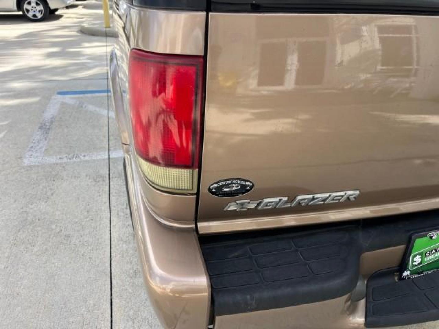 2004 Sandalwood Metallic /Medium Gray Chevrolet Blazer 4WD LS LOW MILES 85,272 (1GNDT13X54K) with an 4.3L Vortec 4300 V6 MFI Engine engine, Automatic transmission, located at 4701 North Dixie Hwy, Pompano Beach, FL, 33064, (954) 422-2889, 26.240938, -80.123474 - OUR WEBPAGE FLORIDACARS1.COM HAS OVER 100 PHOTOS AND FREE CARFAX LINK 2004 CHEVROLET BLAZER LS ROAD READY 4.3L V6 VIN: 1GNDT13X54K147505 NO ACCIDENTS 4 DOOR WAGON/SPORT UTILITY NO RECALLS 4X4 4.3L V6 F LOW MILES 85,272 GASOLINE 30 SERVICE RECORDS REAR WHEEL DRIVE W/ 4X4 4WD ON DEMAND 4WD Alloy Wheel - Photo#93