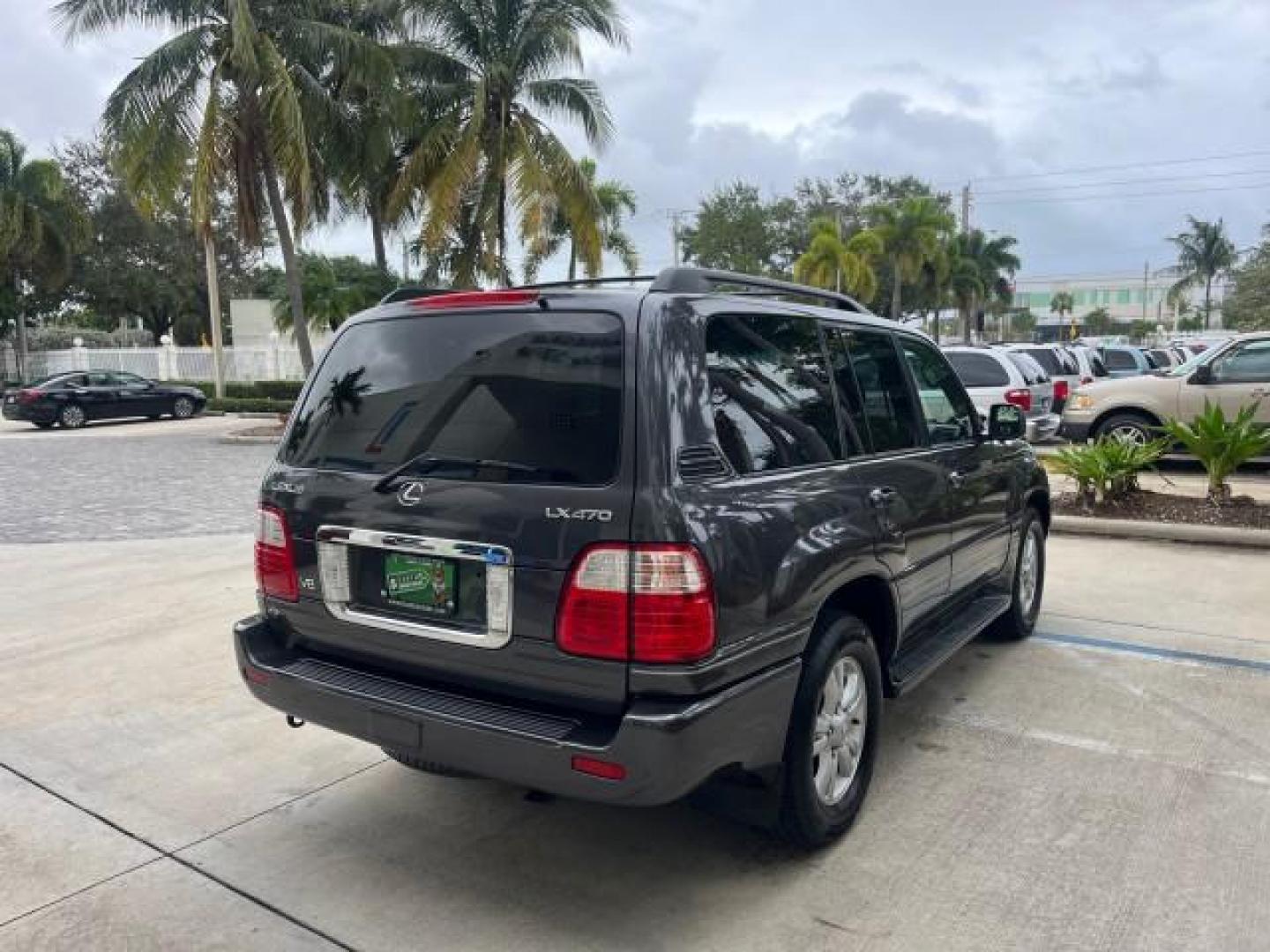 2004 Galactic Gray Mica /Gray Lexus LX 470 4WD LOW MILES 104,194 (JTJHT00W143) with an 4.7L DOHC SFI 32-Valve V8 Engine engine, Automatic transmission, located at 4701 North Dixie Hwy, Pompano Beach, FL, 33064, (954) 422-2889, 26.240938, -80.123474 - 2004 LEXUS LX 470 NEW $70,128 ROAD READY 4.7L V8 VIN: JTJHT00W143540859 NO ACCIDENTS NO RECALLS 4 DOOR WAGON/SPORT UTILITY FLORIDA OWNER LOW MILES 104,194 4.7L V8 F 32V 3 ROW SEATS ARE INCLUDED 19 SERVICE RECORDS AWD GASOLINE ALL WHEEL DRIVE POWER HEATED LEATHER SEATS ALL WHEEL DRIVE BACK UP CAMERA - Photo#7