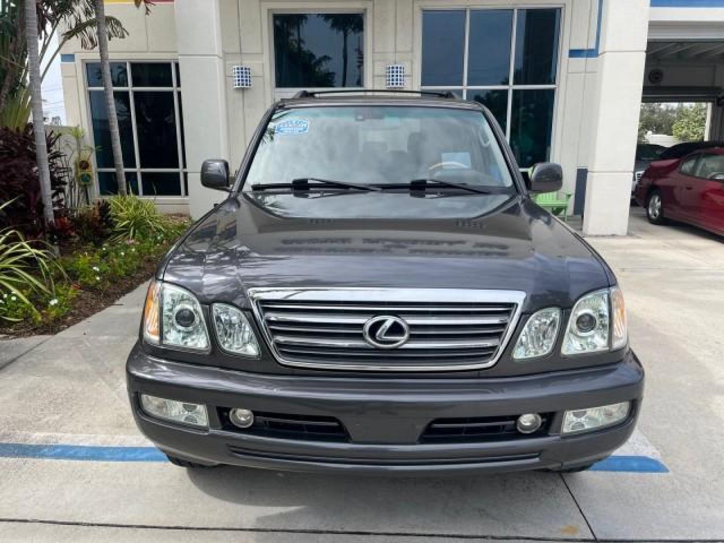 2004 Galactic Gray Mica /Gray Lexus LX 470 4WD LOW MILES 104,194 (JTJHT00W143) with an 4.7L DOHC SFI 32-Valve V8 Engine engine, Automatic transmission, located at 4701 North Dixie Hwy, Pompano Beach, FL, 33064, (954) 422-2889, 26.240938, -80.123474 - 2004 LEXUS LX 470 NEW $70,128 ROAD READY 4.7L V8 VIN: JTJHT00W143540859 NO ACCIDENTS NO RECALLS 4 DOOR WAGON/SPORT UTILITY FLORIDA OWNER LOW MILES 104,194 4.7L V8 F 32V 3 ROW SEATS ARE INCLUDED 19 SERVICE RECORDS AWD GASOLINE ALL WHEEL DRIVE POWER HEATED LEATHER SEATS ALL WHEEL DRIVE BACK UP CAMERA - Photo#81