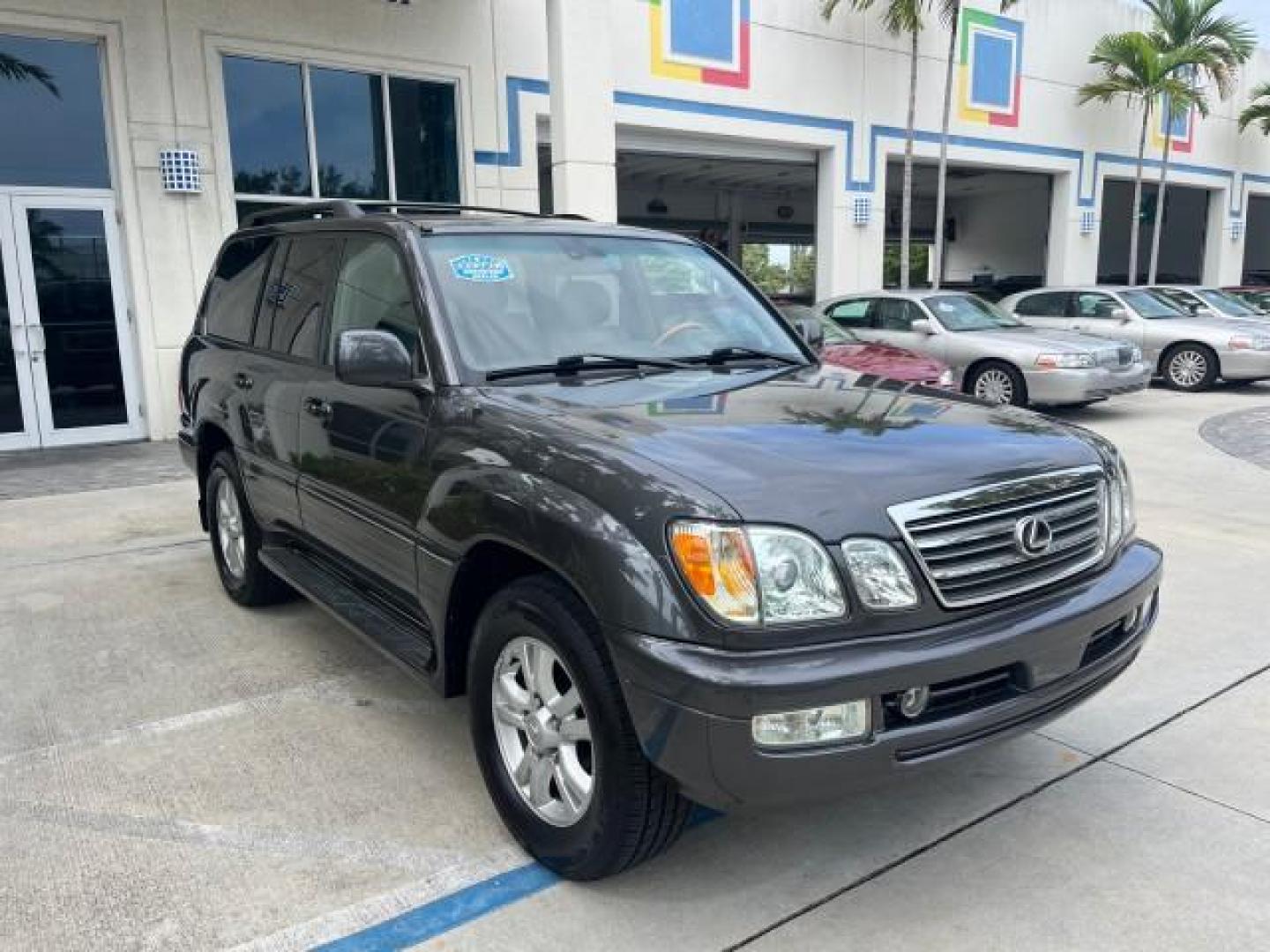 2004 Galactic Gray Mica /Gray Lexus LX 470 4WD LOW MILES 104,194 (JTJHT00W143) with an 4.7L DOHC SFI 32-Valve V8 Engine engine, Automatic transmission, located at 4701 North Dixie Hwy, Pompano Beach, FL, 33064, (954) 422-2889, 26.240938, -80.123474 - 2004 LEXUS LX 470 NEW $70,128 ROAD READY 4.7L V8 VIN: JTJHT00W143540859 NO ACCIDENTS NO RECALLS 4 DOOR WAGON/SPORT UTILITY FLORIDA OWNER LOW MILES 104,194 4.7L V8 F 32V 3 ROW SEATS ARE INCLUDED 19 SERVICE RECORDS AWD GASOLINE ALL WHEEL DRIVE POWER HEATED LEATHER SEATS ALL WHEEL DRIVE BACK UP CAMERA - Photo#83