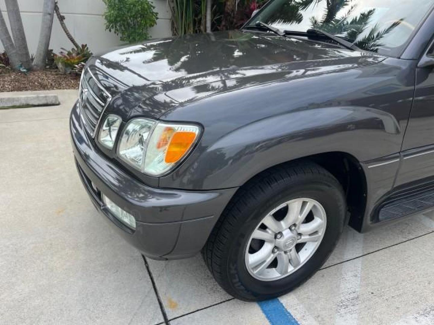 2004 Galactic Gray Mica /Gray Lexus LX 470 4WD LOW MILES 104,194 (JTJHT00W143) with an 4.7L DOHC SFI 32-Valve V8 Engine engine, Automatic transmission, located at 4701 North Dixie Hwy, Pompano Beach, FL, 33064, (954) 422-2889, 26.240938, -80.123474 - 2004 LEXUS LX 470 NEW $70,128 ROAD READY 4.7L V8 VIN: JTJHT00W143540859 NO ACCIDENTS NO RECALLS 4 DOOR WAGON/SPORT UTILITY FLORIDA OWNER LOW MILES 104,194 4.7L V8 F 32V 3 ROW SEATS ARE INCLUDED 19 SERVICE RECORDS AWD GASOLINE ALL WHEEL DRIVE POWER HEATED LEATHER SEATS ALL WHEEL DRIVE BACK UP CAMERA - Photo#91