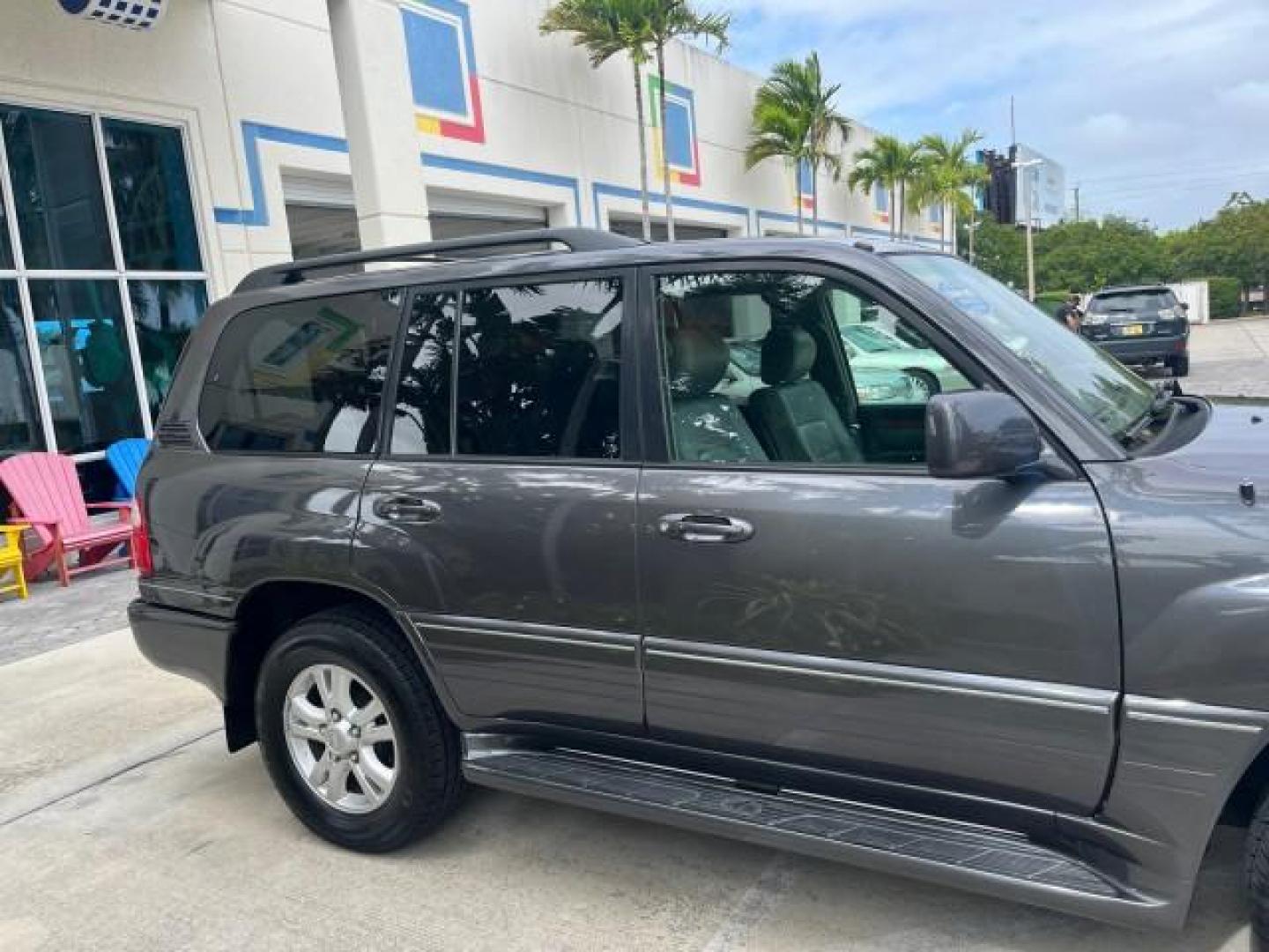 2004 Galactic Gray Mica /Gray Lexus LX 470 4WD LOW MILES 104,194 (JTJHT00W143) with an 4.7L DOHC SFI 32-Valve V8 Engine engine, Automatic transmission, located at 4701 North Dixie Hwy, Pompano Beach, FL, 33064, (954) 422-2889, 26.240938, -80.123474 - 2004 LEXUS LX 470 NEW $70,128 ROAD READY 4.7L V8 VIN: JTJHT00W143540859 NO ACCIDENTS NO RECALLS 4 DOOR WAGON/SPORT UTILITY FLORIDA OWNER LOW MILES 104,194 4.7L V8 F 32V 3 ROW SEATS ARE INCLUDED 19 SERVICE RECORDS AWD GASOLINE ALL WHEEL DRIVE POWER HEATED LEATHER SEATS ALL WHEEL DRIVE BACK UP CAMERA - Photo#93