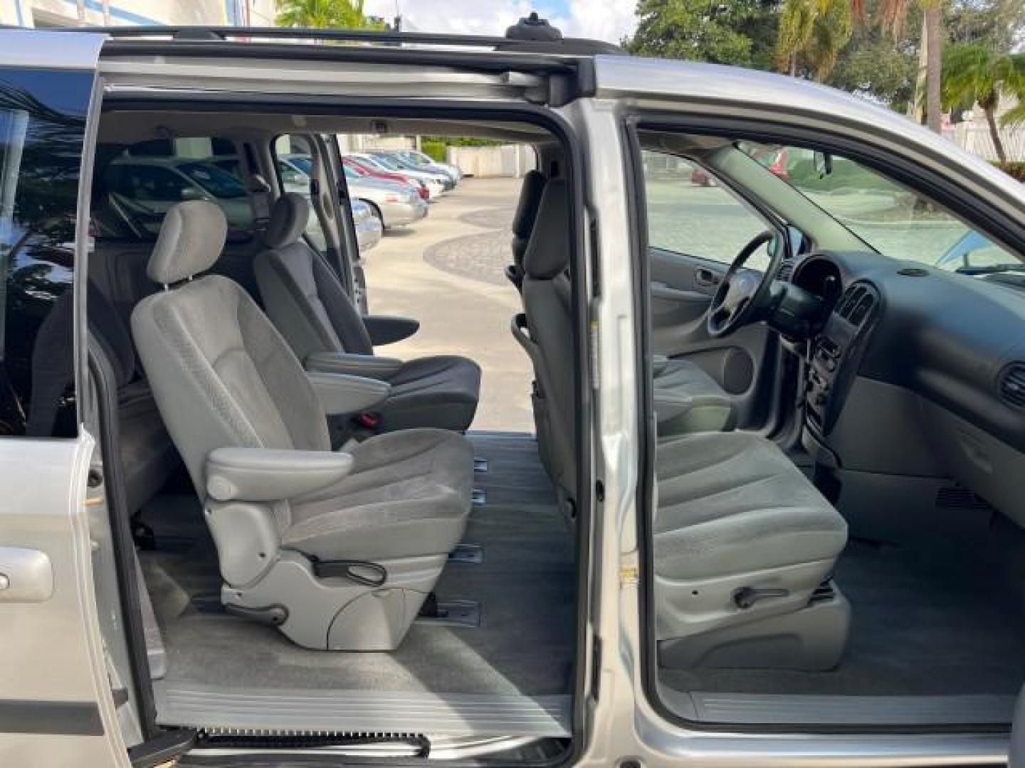 2006 Bright Silver Metallic /Medium Slate Gray Dodge Caravan 1 FL SXT LOW MILES 37,381 (1D4GP45R56B) with an 3.3L OHV V6 Engine engine, Automatic transmission, located at 4701 North Dixie Hwy, Pompano Beach, FL, 33064, (954) 422-2889, 26.240938, -80.123474 - OUR WEBPAGE FLORIDACARS1.COM HAS OVER 100 PHOTOS AND FREE CARFAX LINK 2006 DODGE CARAVAN SXT ROAD READY 3.3L V6 VIN: 1D4GP45R56B518761 NO ACCIDENTS VAN 17 SERVICE RECORDS NO RECALLS 3.3L V6 F OHV 26 MPG 1 OWNER FLORIDA GASOLINE POWER SEATS LOW MILES 37,381 FRONT WHEEL DRIVE POWER SLIDING DOOR 3 ROW - Photo#12