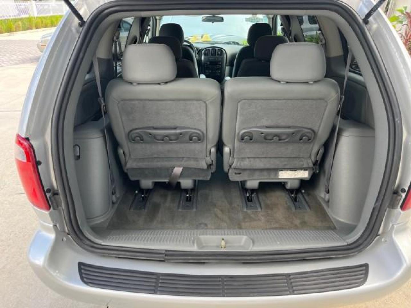 2006 Bright Silver Metallic /Medium Slate Gray Dodge Caravan 1 FL SXT LOW MILES 37,381 (1D4GP45R56B) with an 3.3L OHV V6 Engine engine, Automatic transmission, located at 4701 North Dixie Hwy, Pompano Beach, FL, 33064, (954) 422-2889, 26.240938, -80.123474 - OUR WEBPAGE FLORIDACARS1.COM HAS OVER 100 PHOTOS AND FREE CARFAX LINK 2006 DODGE CARAVAN SXT ROAD READY 3.3L V6 VIN: 1D4GP45R56B518761 NO ACCIDENTS VAN 17 SERVICE RECORDS NO RECALLS 3.3L V6 F OHV 26 MPG 1 OWNER FLORIDA GASOLINE POWER SEATS LOW MILES 37,381 FRONT WHEEL DRIVE POWER SLIDING DOOR 3 ROW - Photo#67