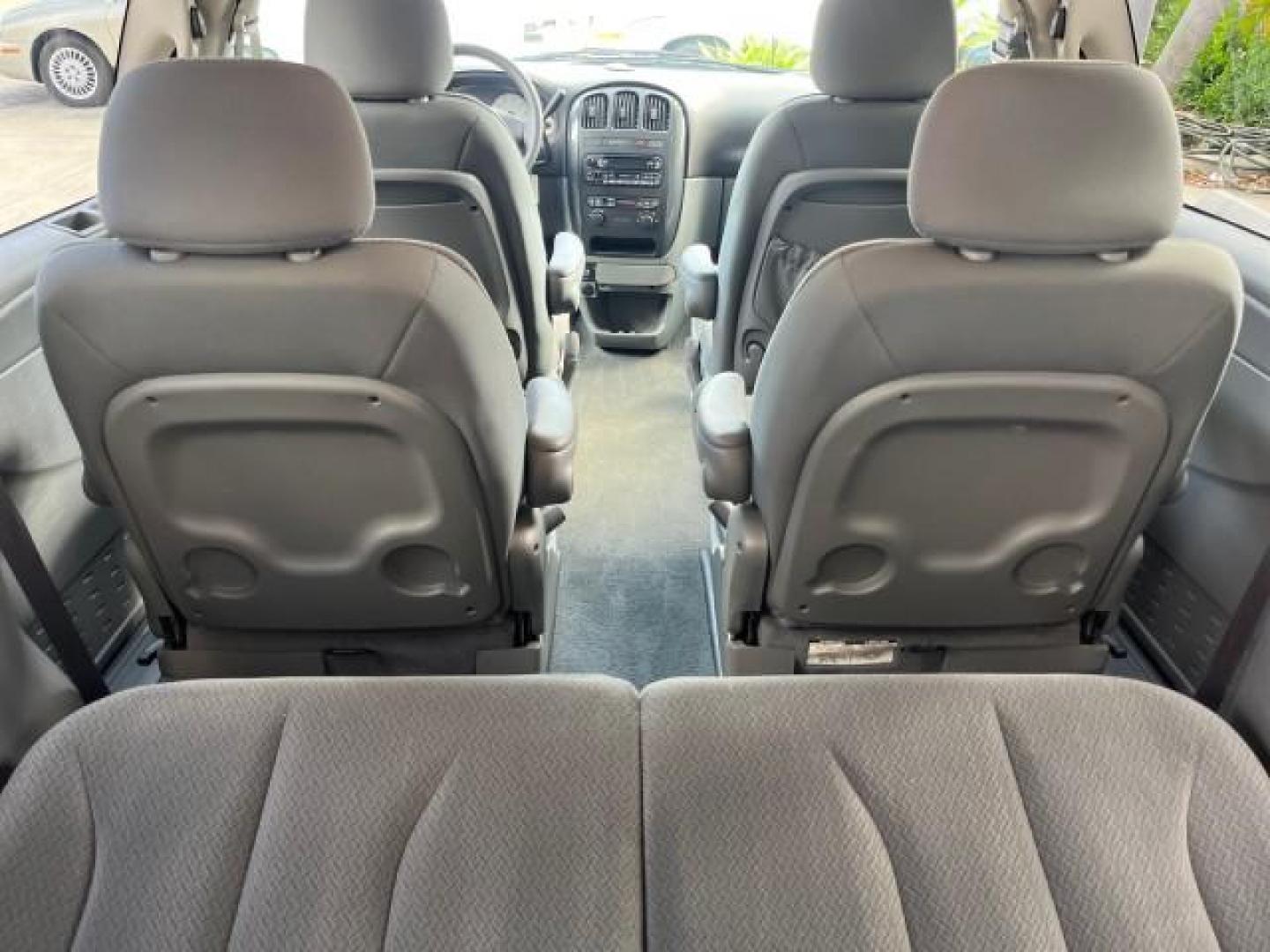 2006 Bright Silver Metallic /Medium Slate Gray Dodge Caravan 1 FL SXT LOW MILES 37,381 (1D4GP45R56B) with an 3.3L OHV V6 Engine engine, Automatic transmission, located at 4701 North Dixie Hwy, Pompano Beach, FL, 33064, (954) 422-2889, 26.240938, -80.123474 - OUR WEBPAGE FLORIDACARS1.COM HAS OVER 100 PHOTOS AND FREE CARFAX LINK 2006 DODGE CARAVAN SXT ROAD READY 3.3L V6 VIN: 1D4GP45R56B518761 NO ACCIDENTS VAN 17 SERVICE RECORDS NO RECALLS 3.3L V6 F OHV 26 MPG 1 OWNER FLORIDA GASOLINE POWER SEATS LOW MILES 37,381 FRONT WHEEL DRIVE POWER SLIDING DOOR 3 ROW - Photo#70