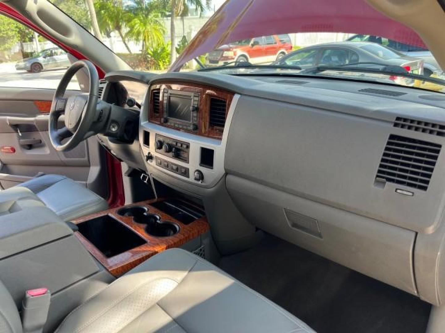 2007 Flame Red /Dark Slate Gray Dodge Ram 3500 1 FL DUALLY 6.7 TURBO DIESEL LO MI 53,485 (3D7ML48A47G) with an 6.7L Straight 6-Cyl Engine engine, Automatic transmission, located at 4701 North Dixie Hwy, Pompano Beach, FL, 33064, (954) 422-2889, 26.240938, -80.123474 - OUR WEBPAGE FLORIDACARS1.COM HAS OVER 100 PHOTOS AND FREE CARFAX LINK 2007 DODGE RAM 3500 ST ROAD READY WORK READY VIN: 3D7ML48A47G841313 NO ACCIDENTS NO RECALLS CREW PICKUP 5TH WHEEL HITCH 1 OWNER FLORIDA 6.7L I6 F LOW MILES 53,485 8,2 FT BED TURBO DIESEL POWER LEATHER SEATS REAR WHEEL DRIVE CUMMIN - Photo#30