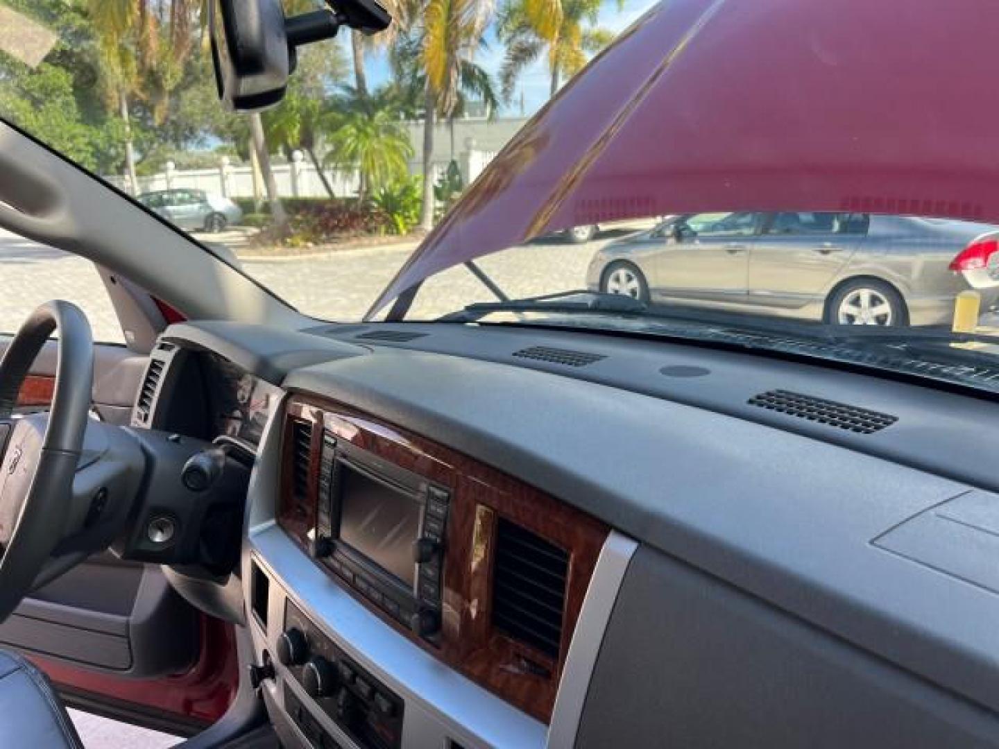 2007 Flame Red /Dark Slate Gray Dodge Ram 3500 1 FL DUALLY 6.7 TURBO DIESEL LO MI 53,485 (3D7ML48A47G) with an 6.7L Straight 6-Cyl Engine engine, Automatic transmission, located at 4701 North Dixie Hwy, Pompano Beach, FL, 33064, (954) 422-2889, 26.240938, -80.123474 - OUR WEBPAGE FLORIDACARS1.COM HAS OVER 100 PHOTOS AND FREE CARFAX LINK 2007 DODGE RAM 3500 ST ROAD READY WORK READY VIN: 3D7ML48A47G841313 NO ACCIDENTS NO RECALLS CREW PICKUP 5TH WHEEL HITCH 1 OWNER FLORIDA 6.7L I6 F LOW MILES 53,485 8,2 FT BED TURBO DIESEL POWER LEATHER SEATS REAR WHEEL DRIVE CUMMIN - Photo#34